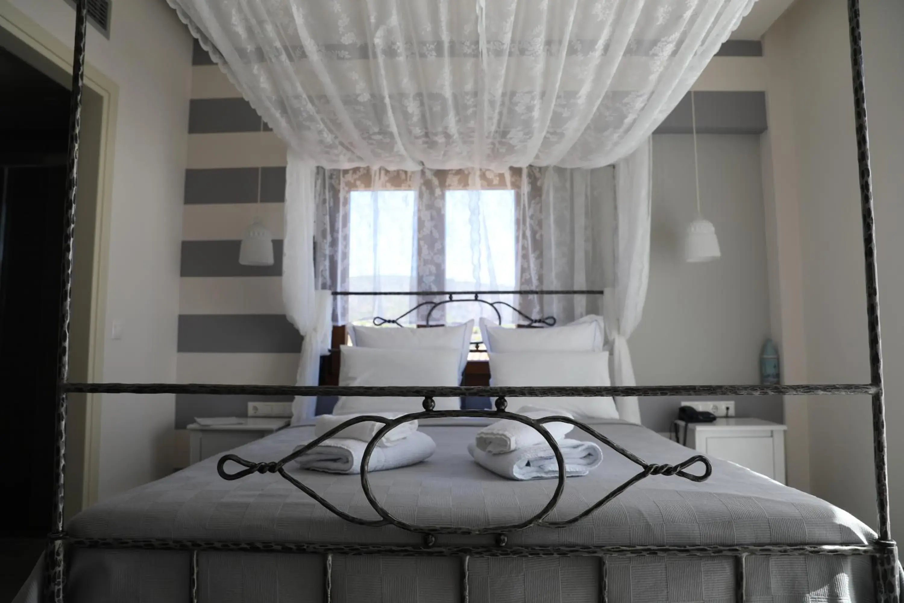 Bed in Dimitra Boutique Hotel