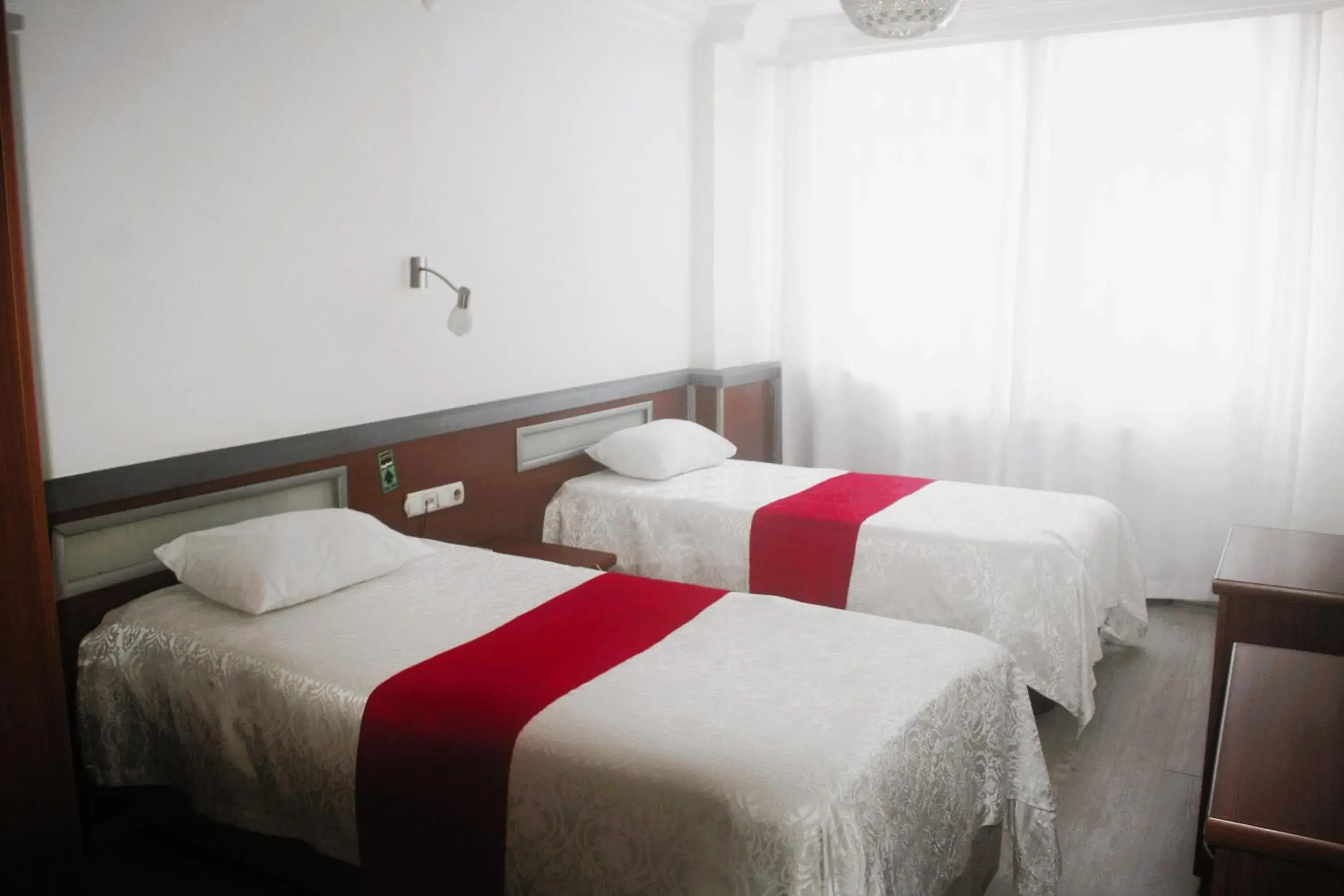 Bed in Yeni Kosk Esra Hotel