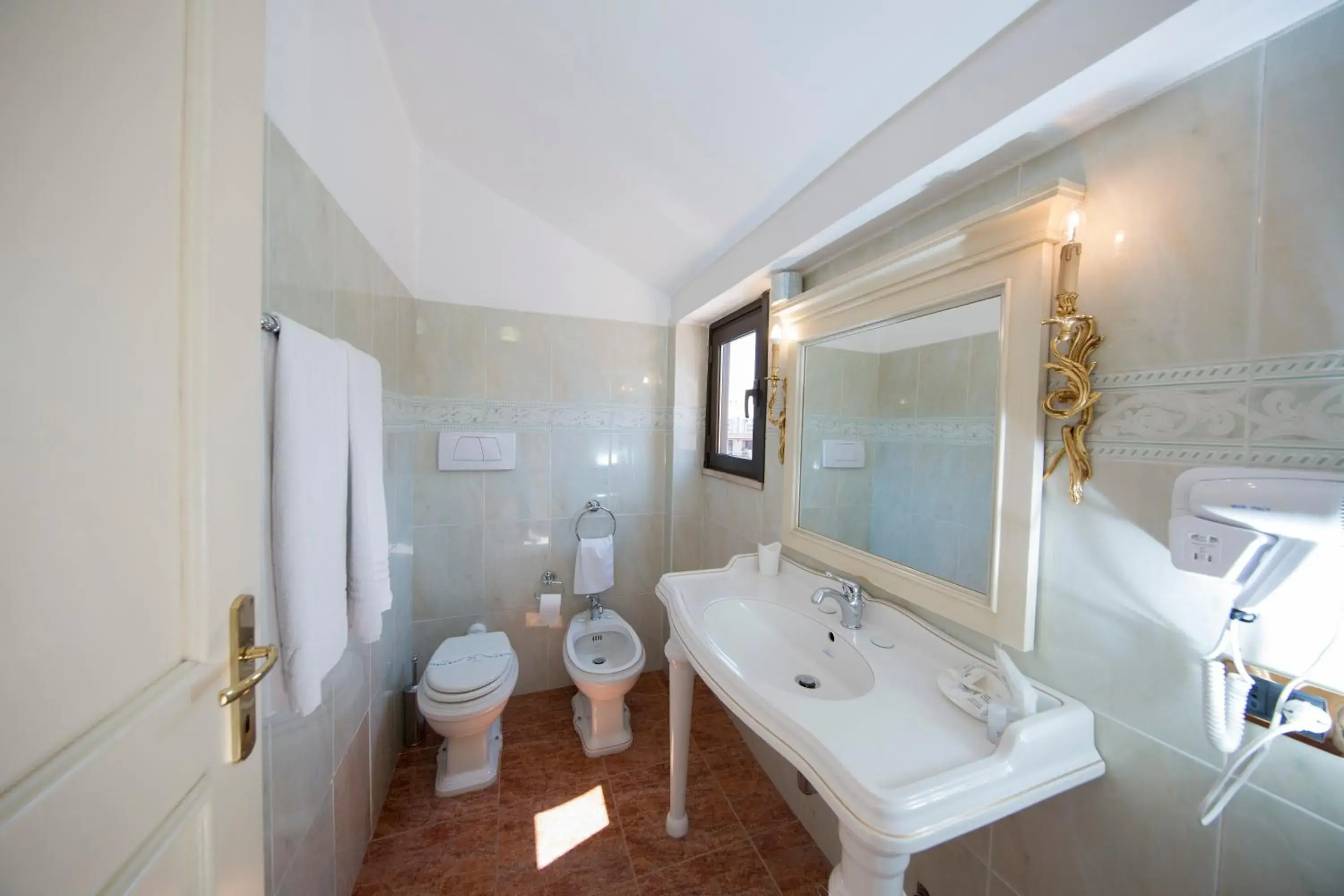 Bathroom in Mancini Park Hotel