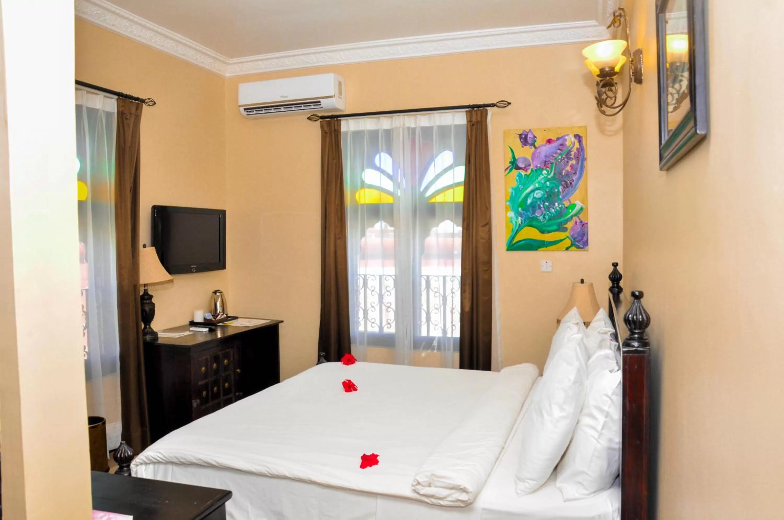 Bedroom, Bed in Golden Tulip Stone Town Boutique