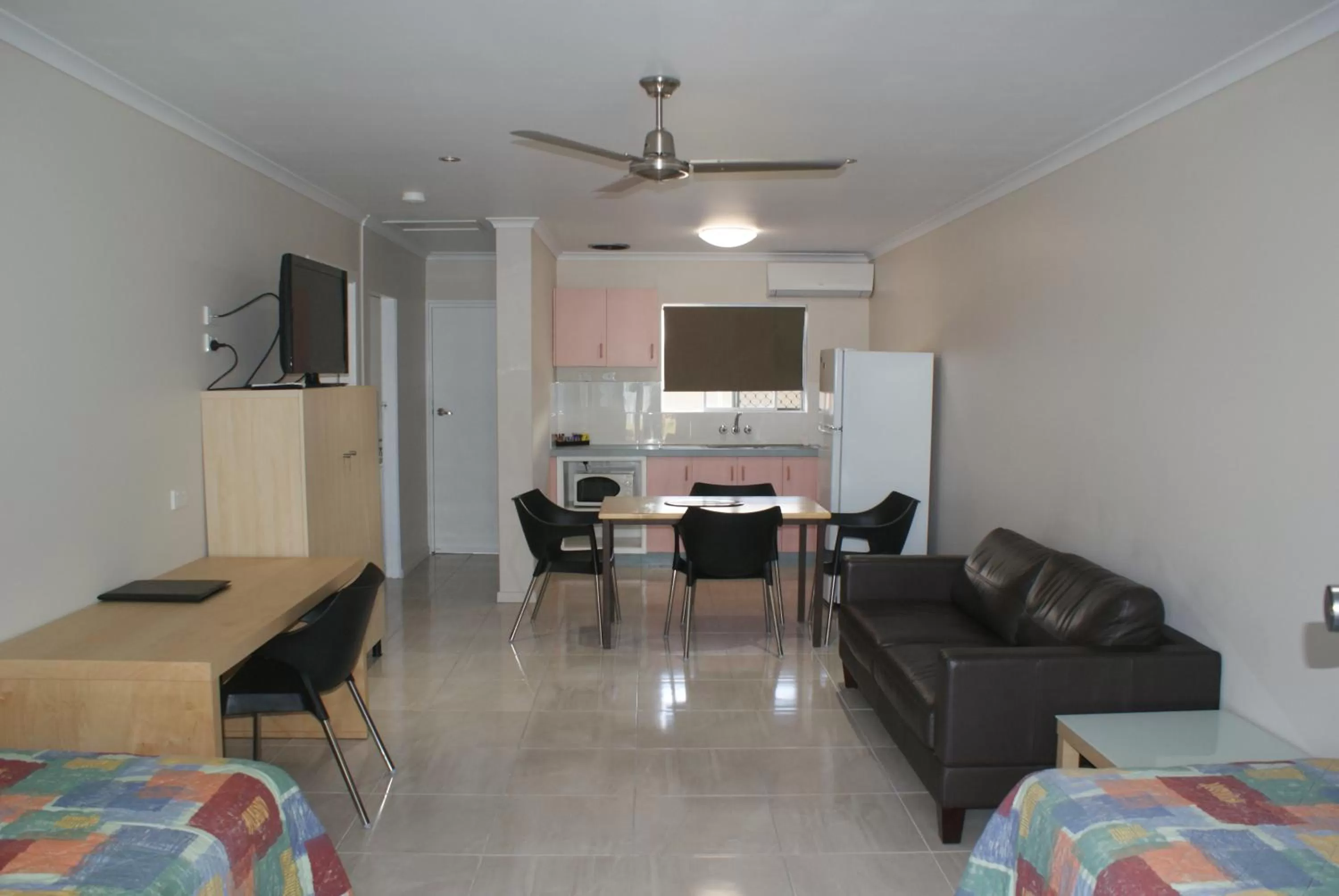 Bed, Seating Area in Mackay Apartments The Rover