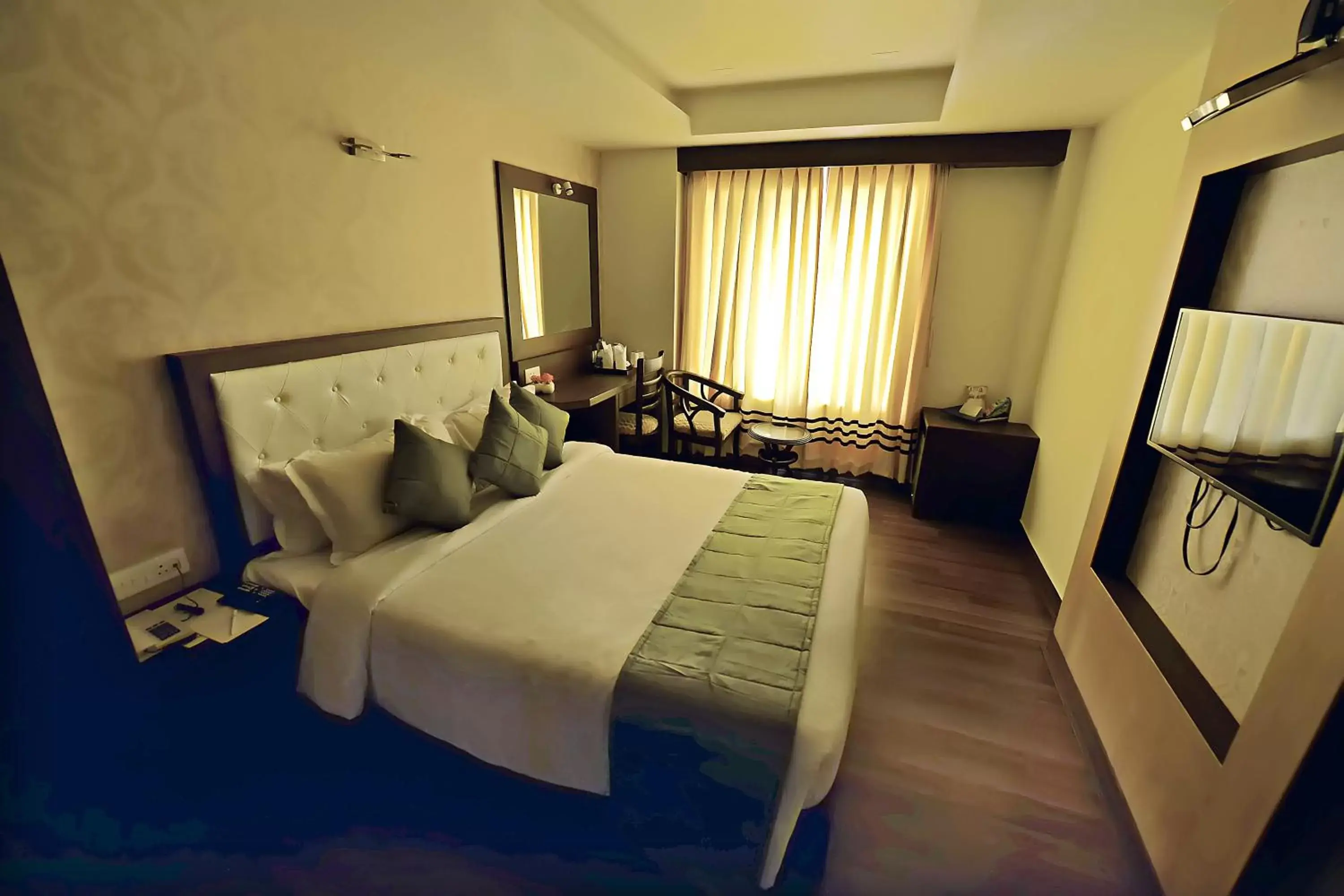 Photo of the whole room, Bed in Ethnotel, Kolkata Airport