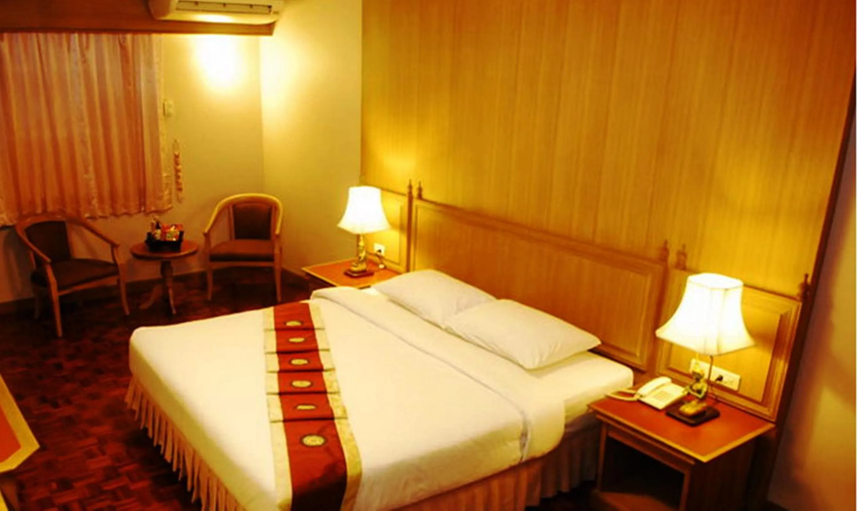 Bed in Silom Village Inn