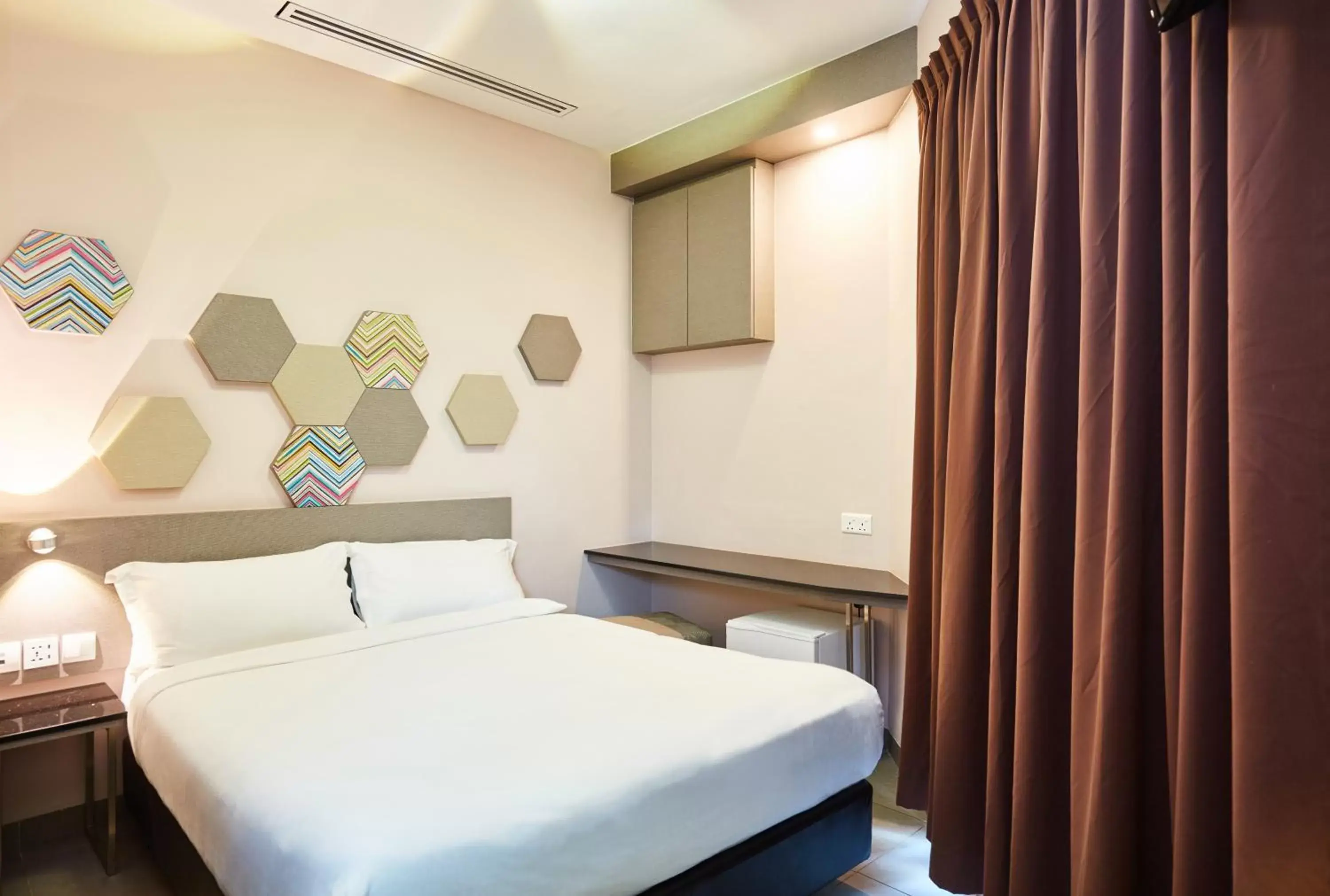 Bed in Ibis Budget Singapore Imperial