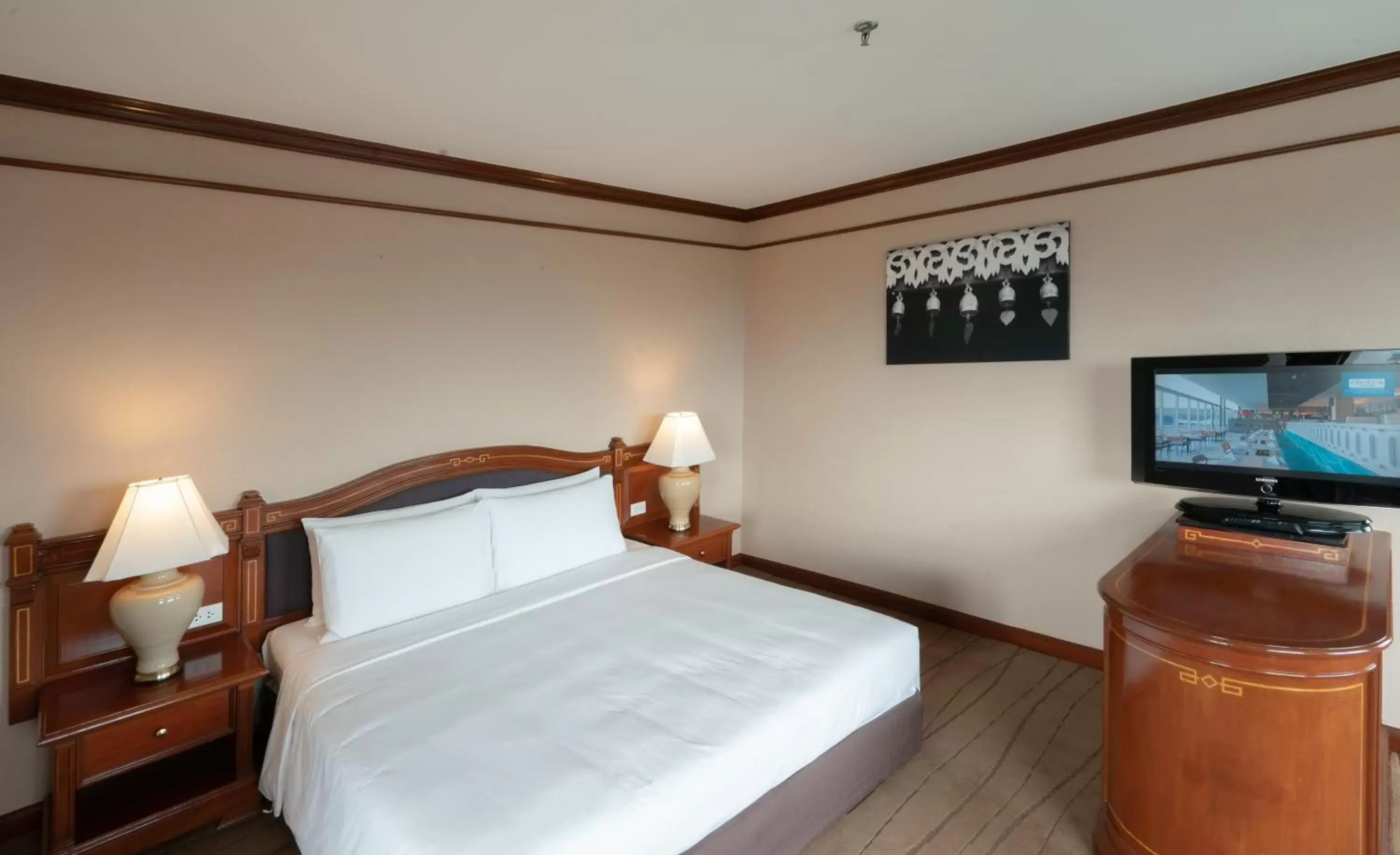 Bed in Centara Riverside Hotel Chiang Mai