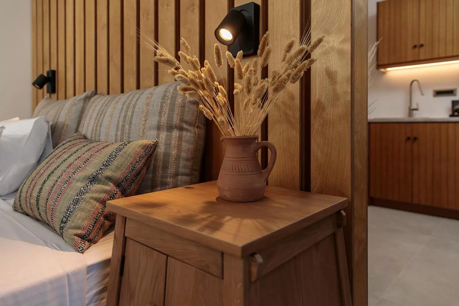 Bed, Seating Area in Makava Suites Naxos