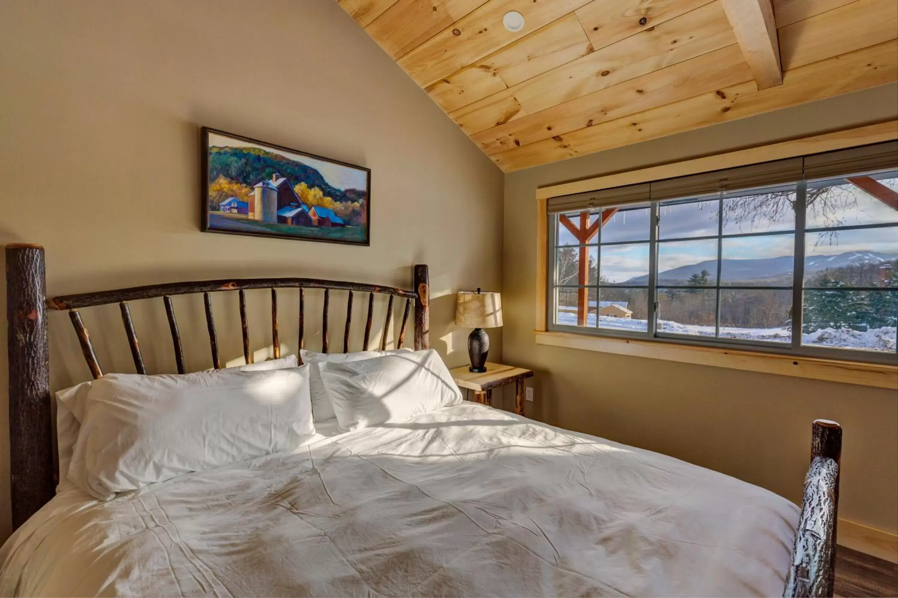 Bed in The Lodge by Sunapee Stays