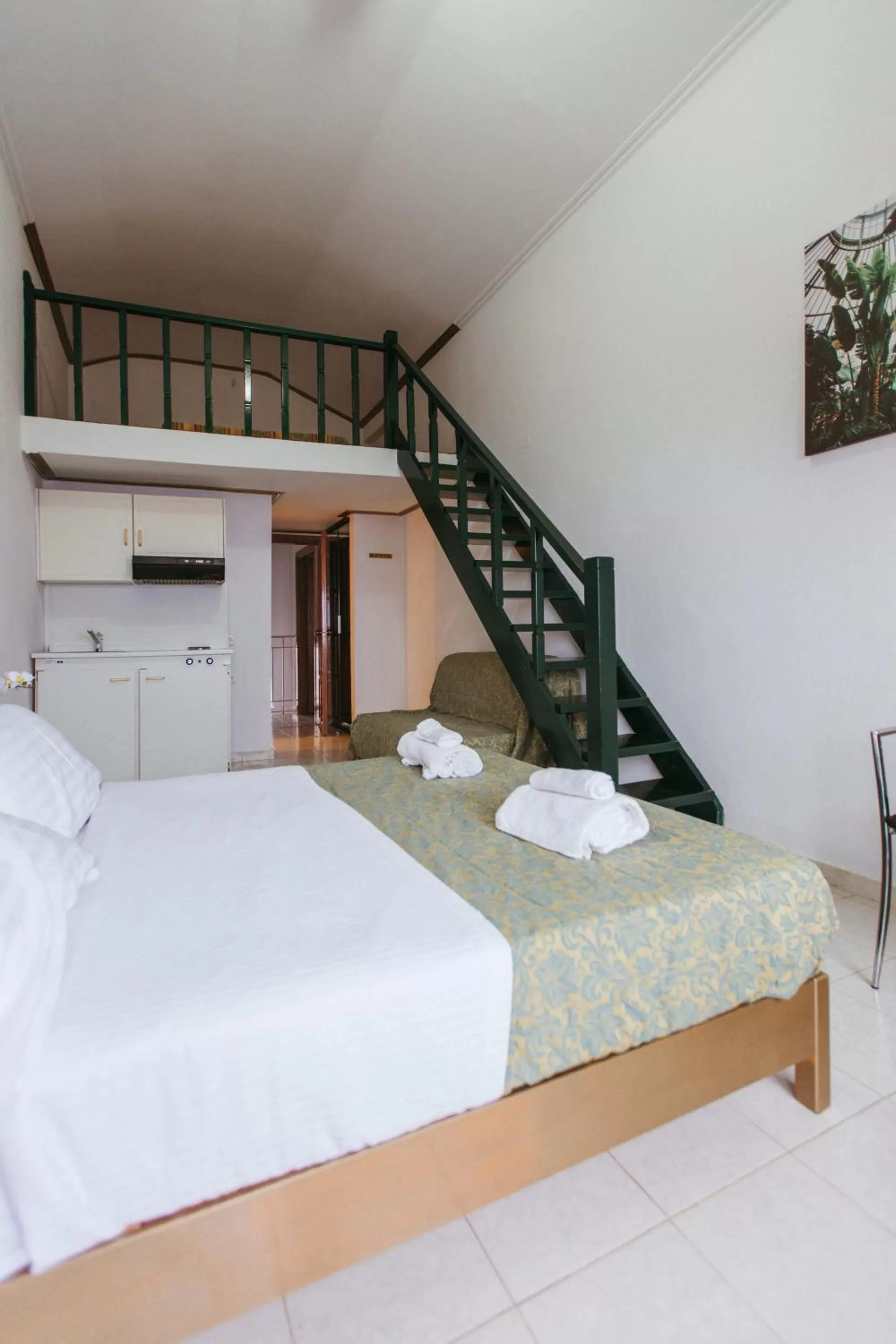 Bedroom in Hotel Christina - Happy Days