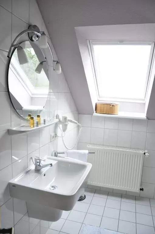 Bathroom in Berghof Hotel
