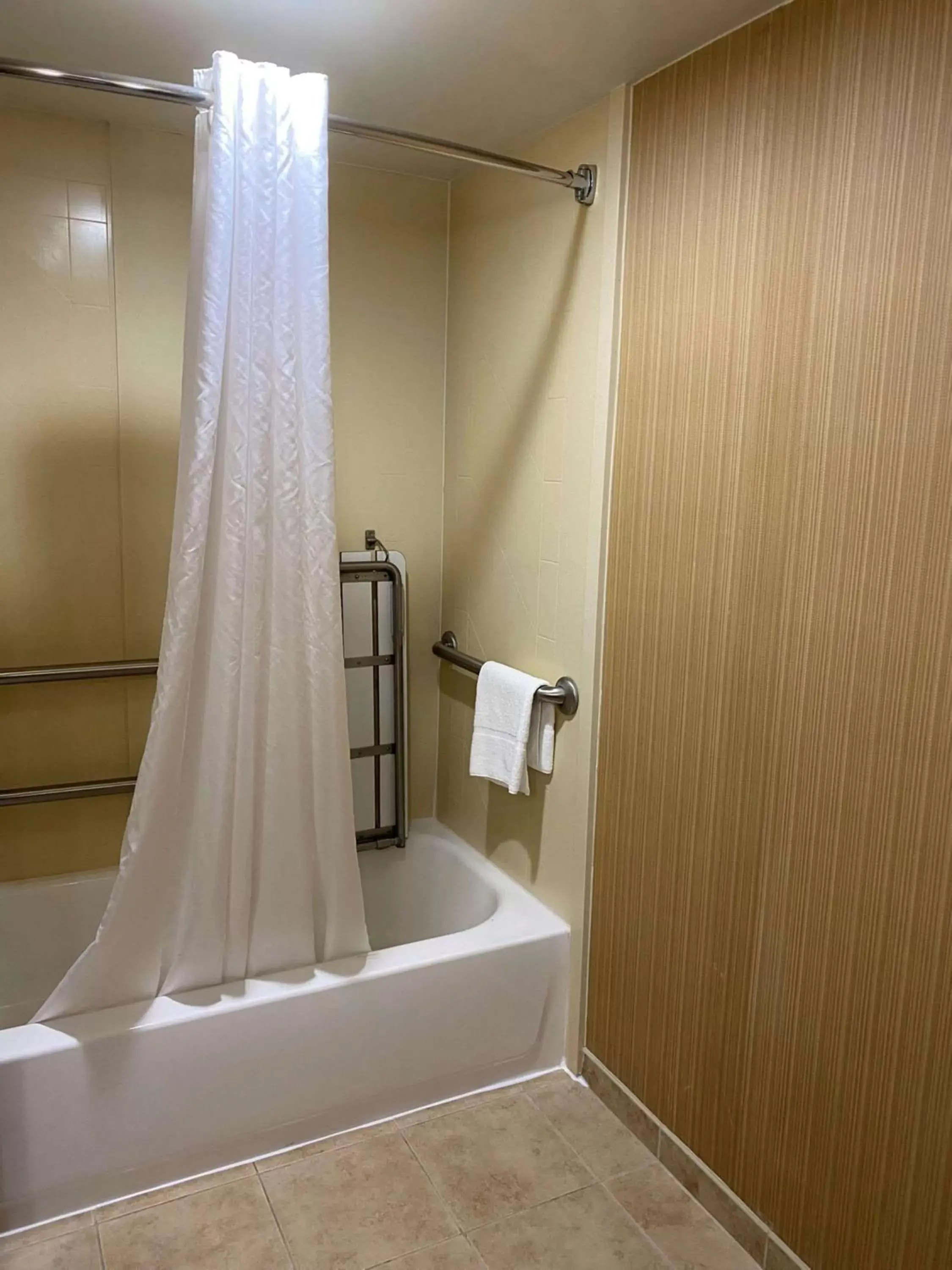 Bathroom in The Addison Hotel SureStay Collection by Best Western