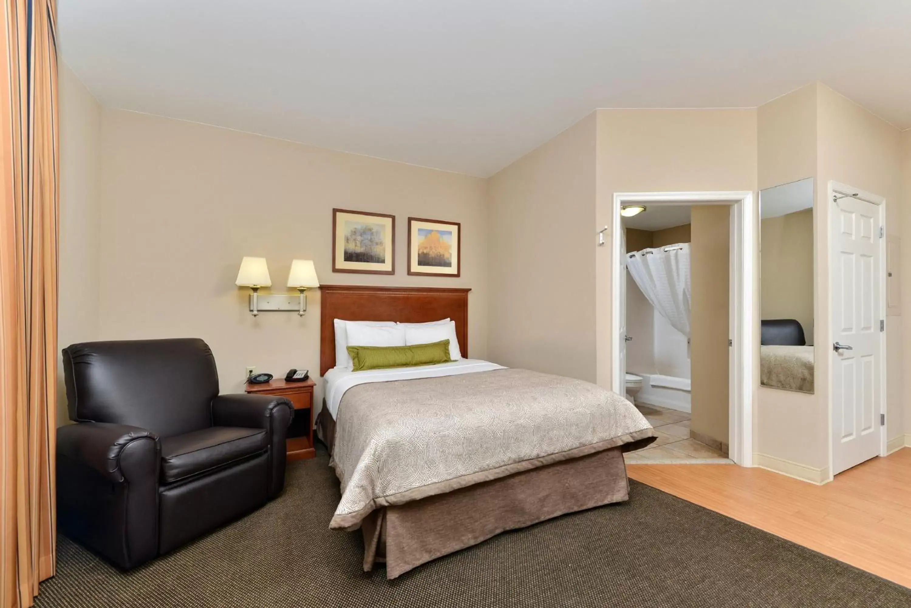 Photo of the whole room, Bed in Candlewood Suites Chambersburg, an IHG Hotel