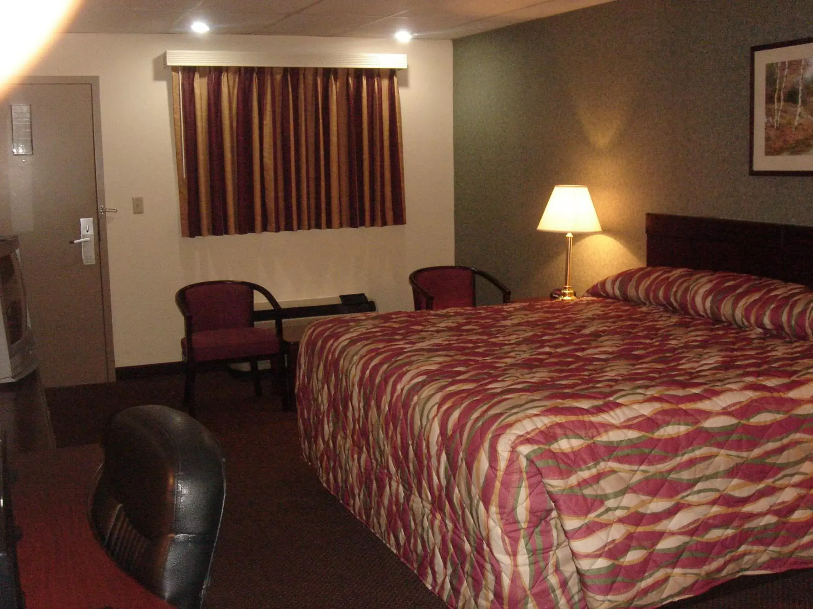 Bedroom, Bed in German Village Inn Motel Bedroom, Bed in German Village Inn Motel