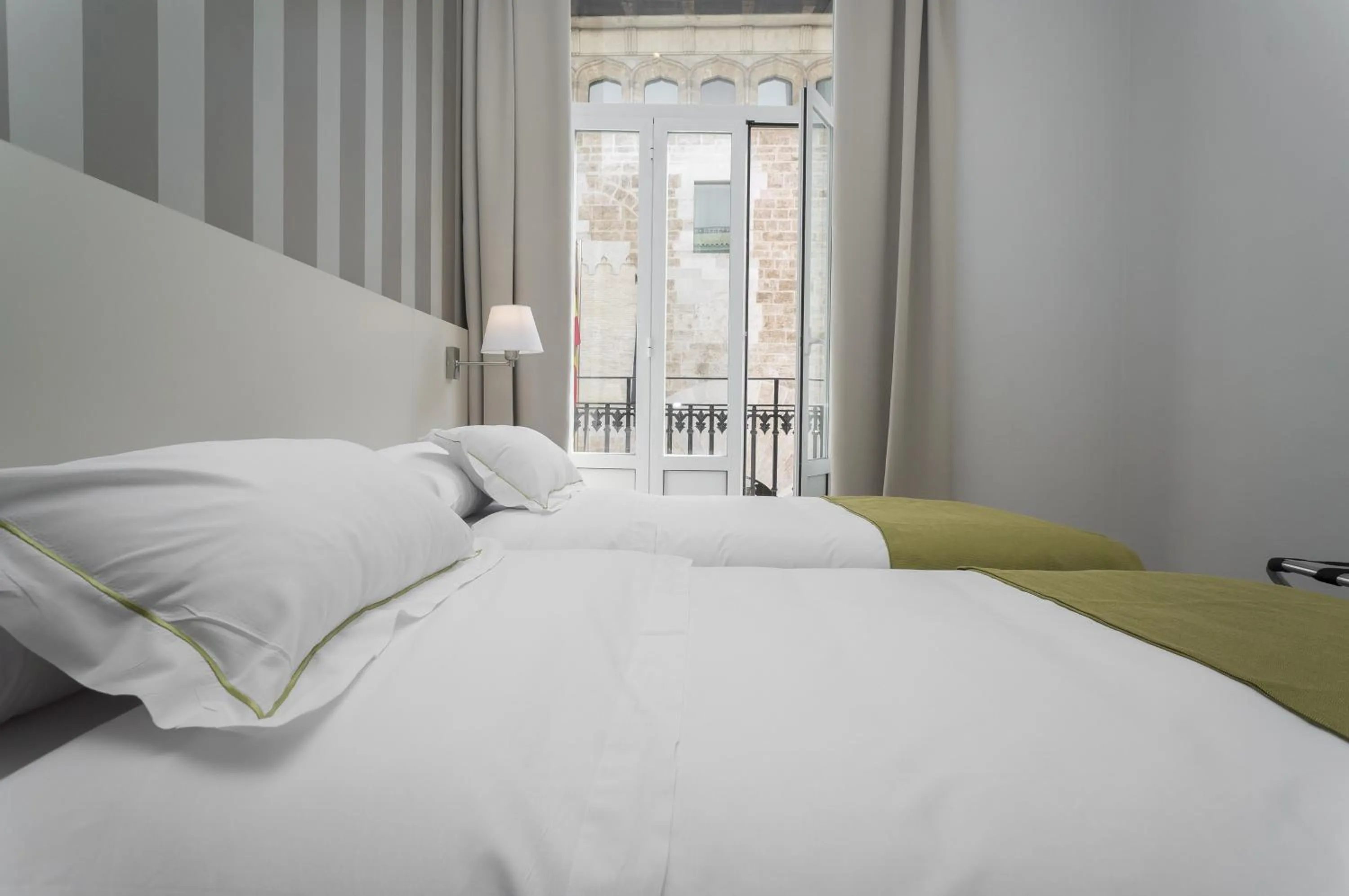 Bed in Hotel San Lorenzo Boutique Plaza