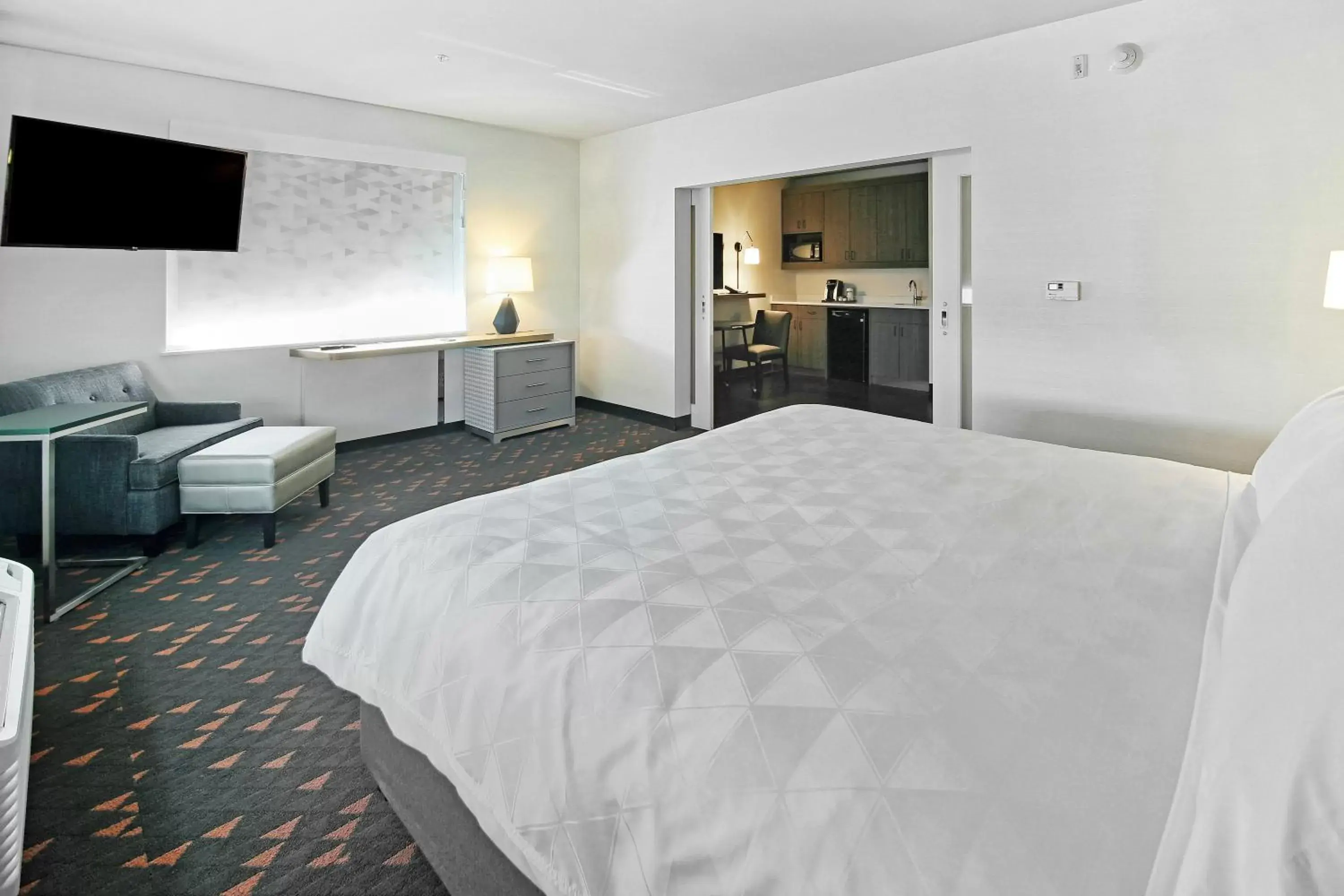 Photo of the whole room, Bed in Holiday Inn Hotel & Suites - Calgary Airport North, an IHG Hotel