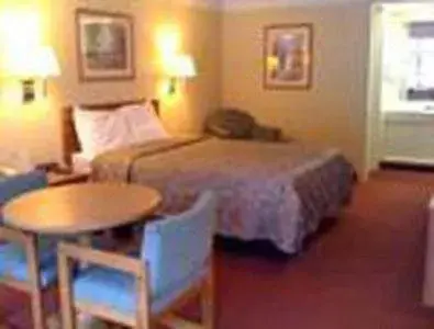 Bed in Knights Inn Charleston West Virginia