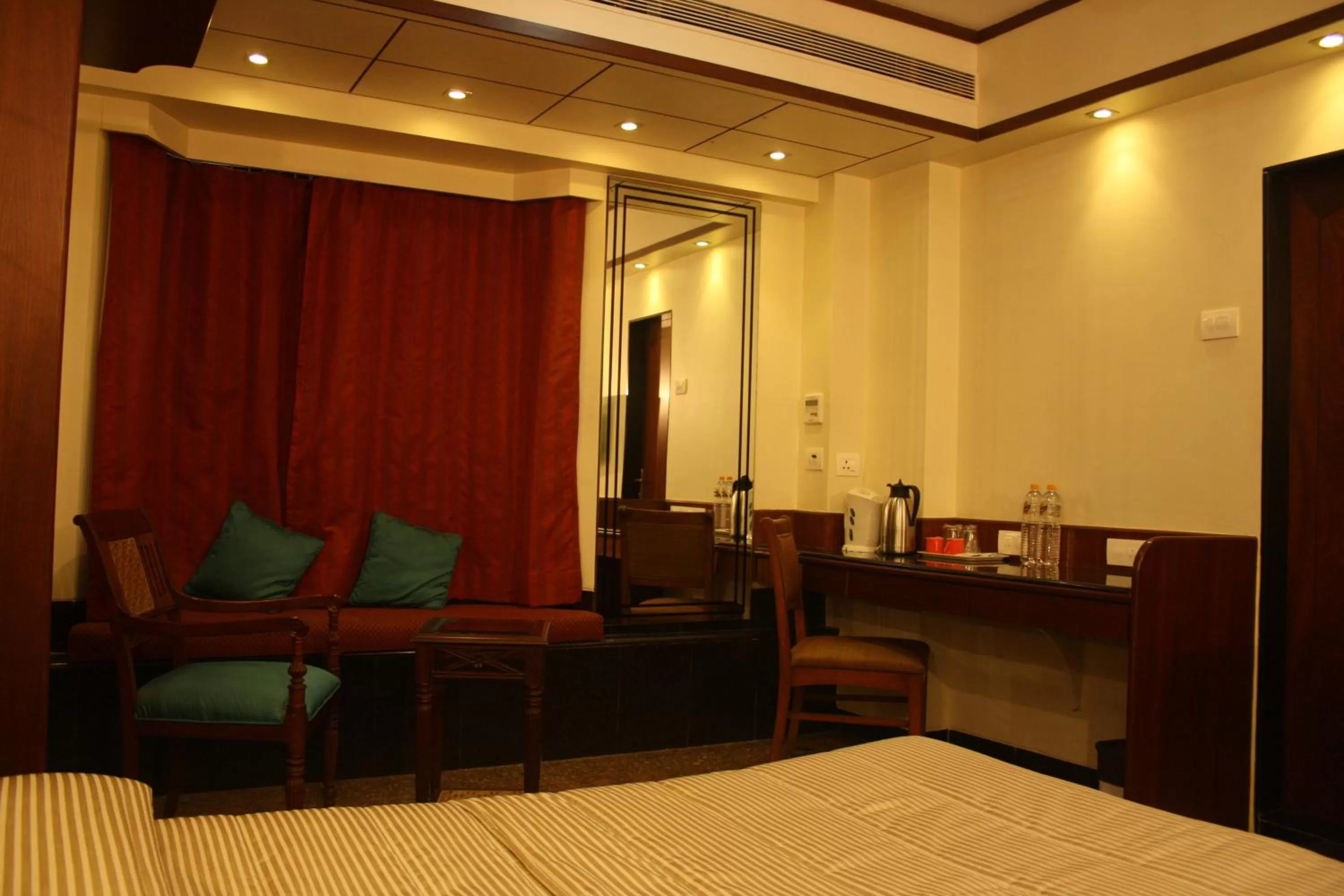 Bed in Hotel Karl Residency