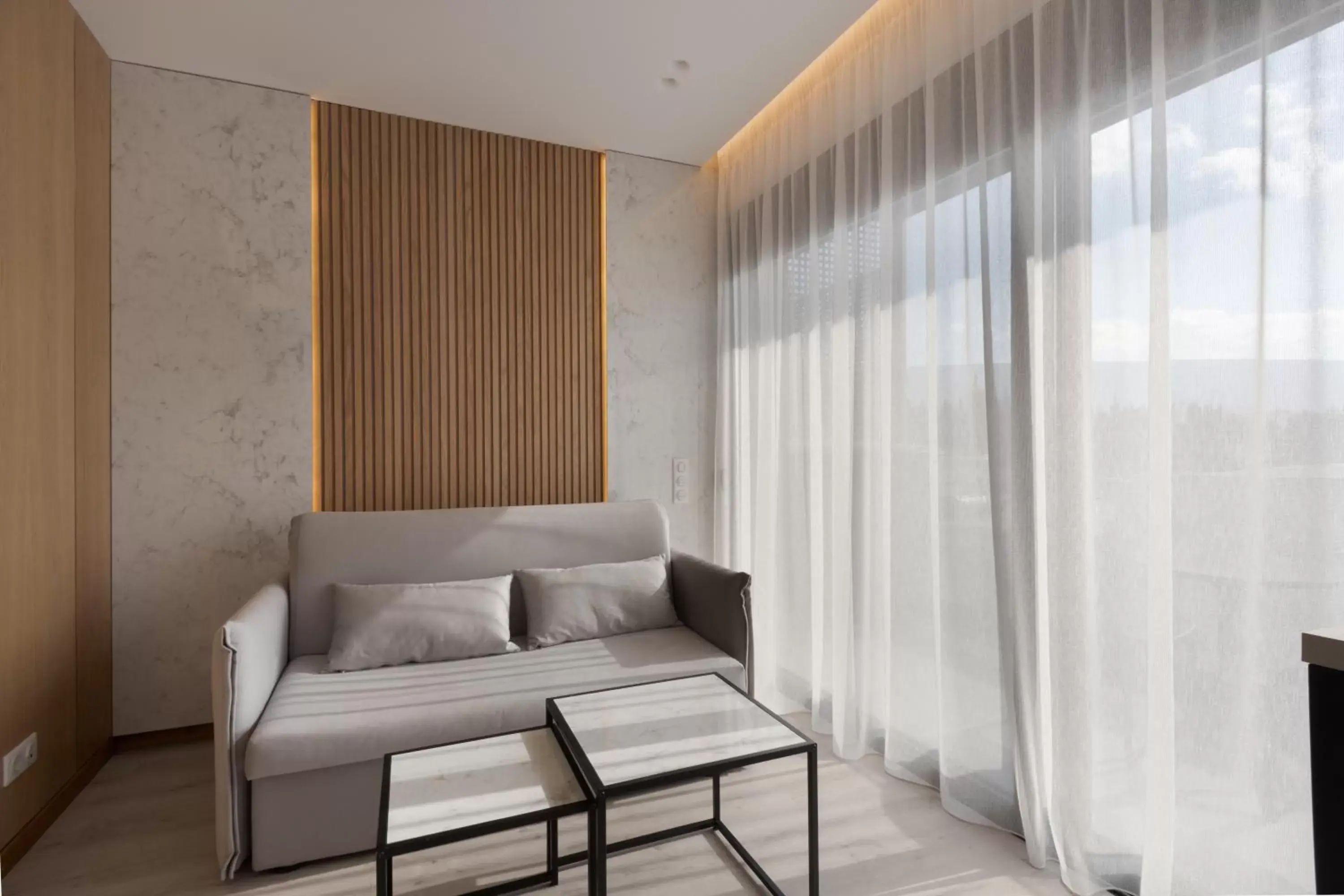 Seating Area in LUX&EASY Acropolis Suites