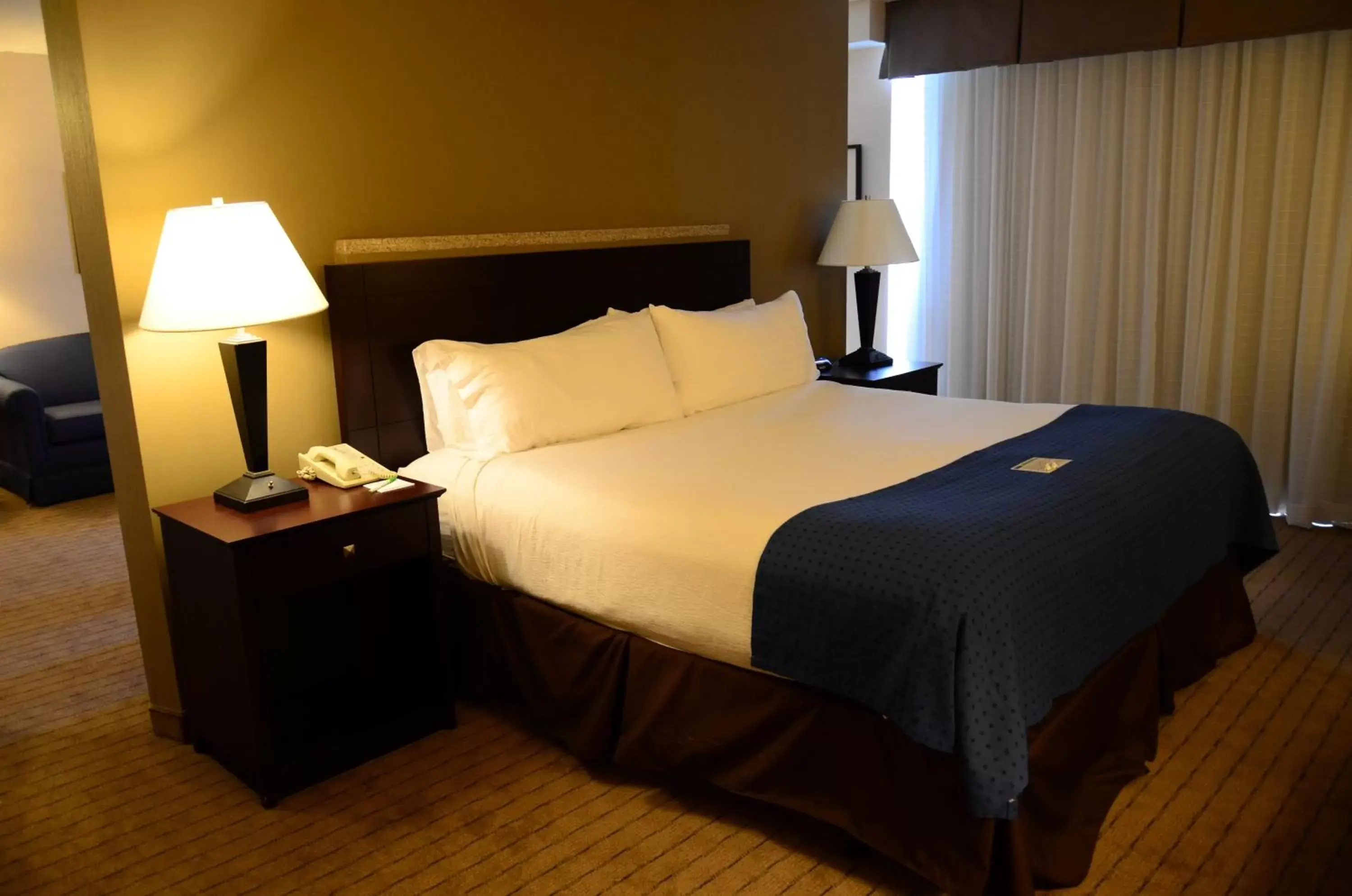 Bed in Wingate by Wyndham Kansas City