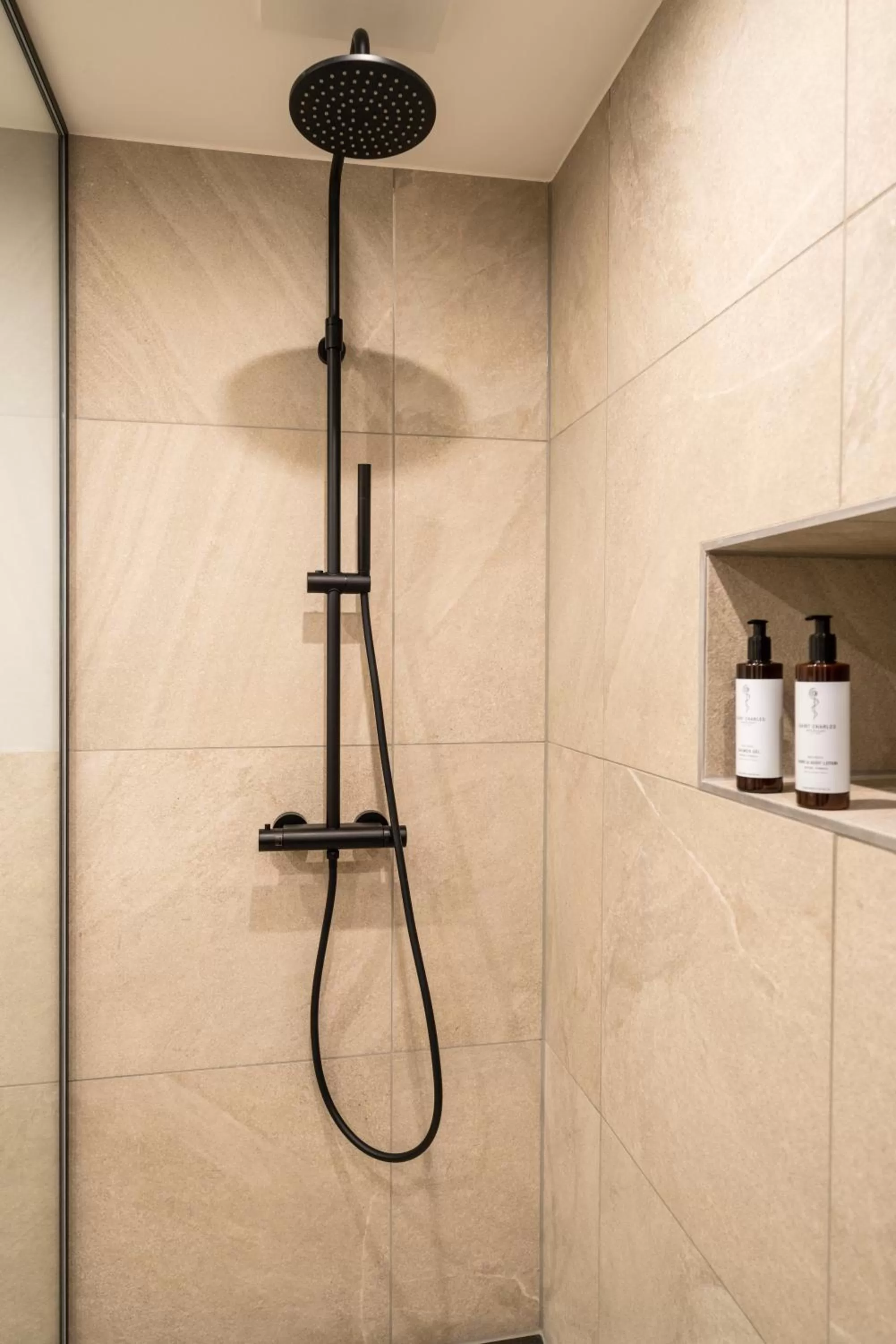 Shower in Black F Tower - Serviced Apartments
