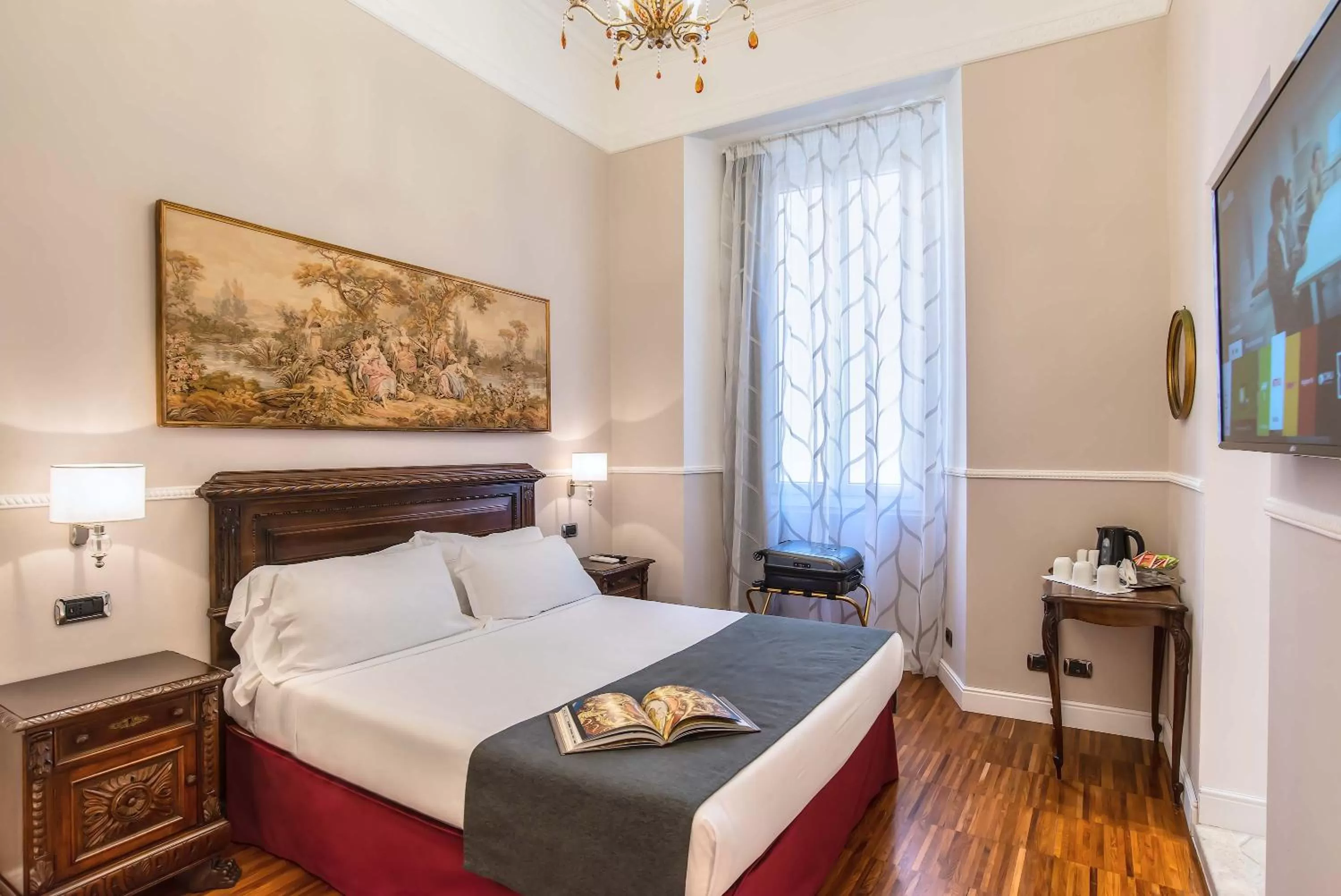Bed in I TRE MOSCHETTIERI - D'ARTAGNAN Luxury Guest House