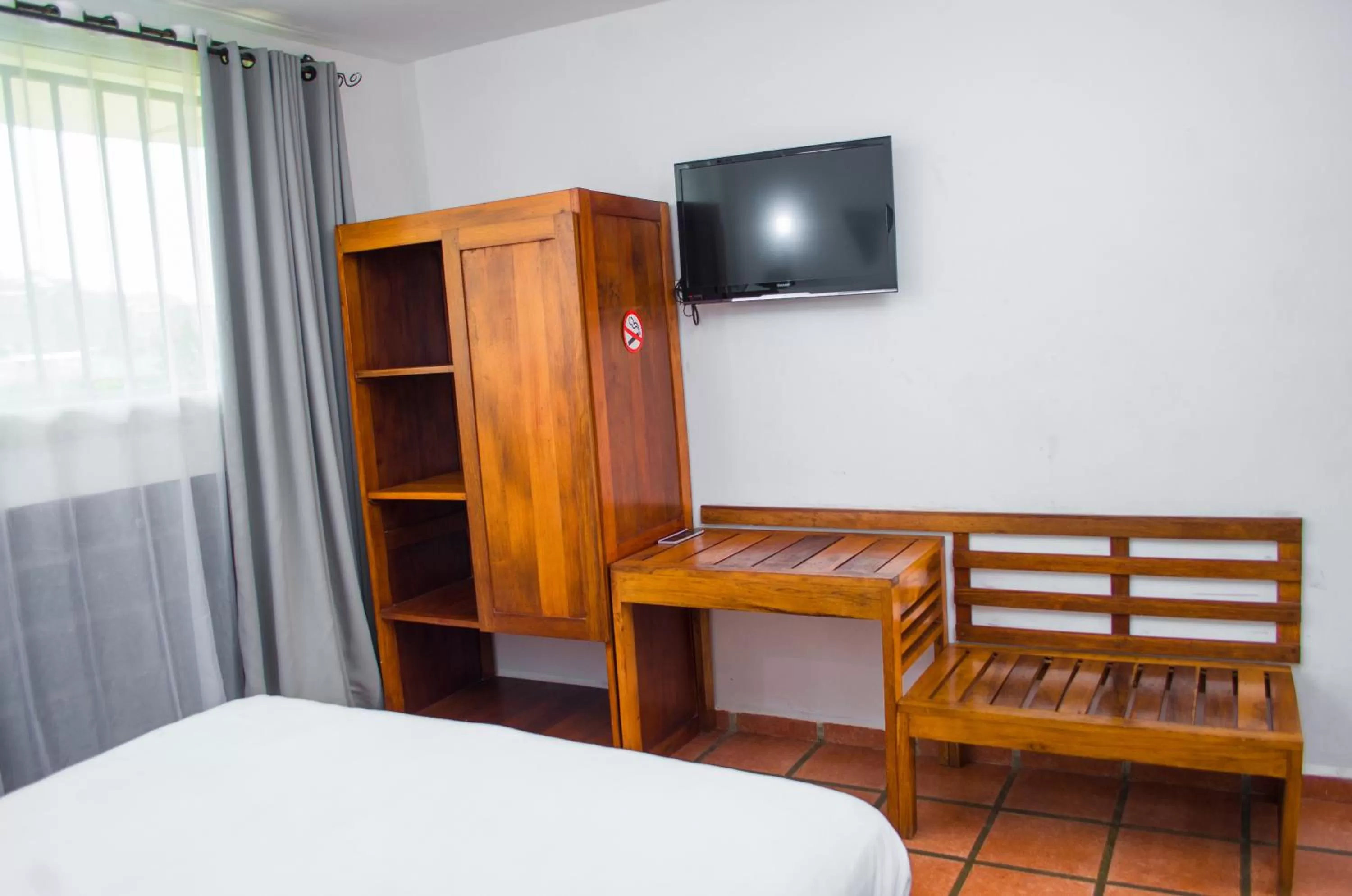 TV and multimedia, Bed in Ikopa Hôtel Madagascar