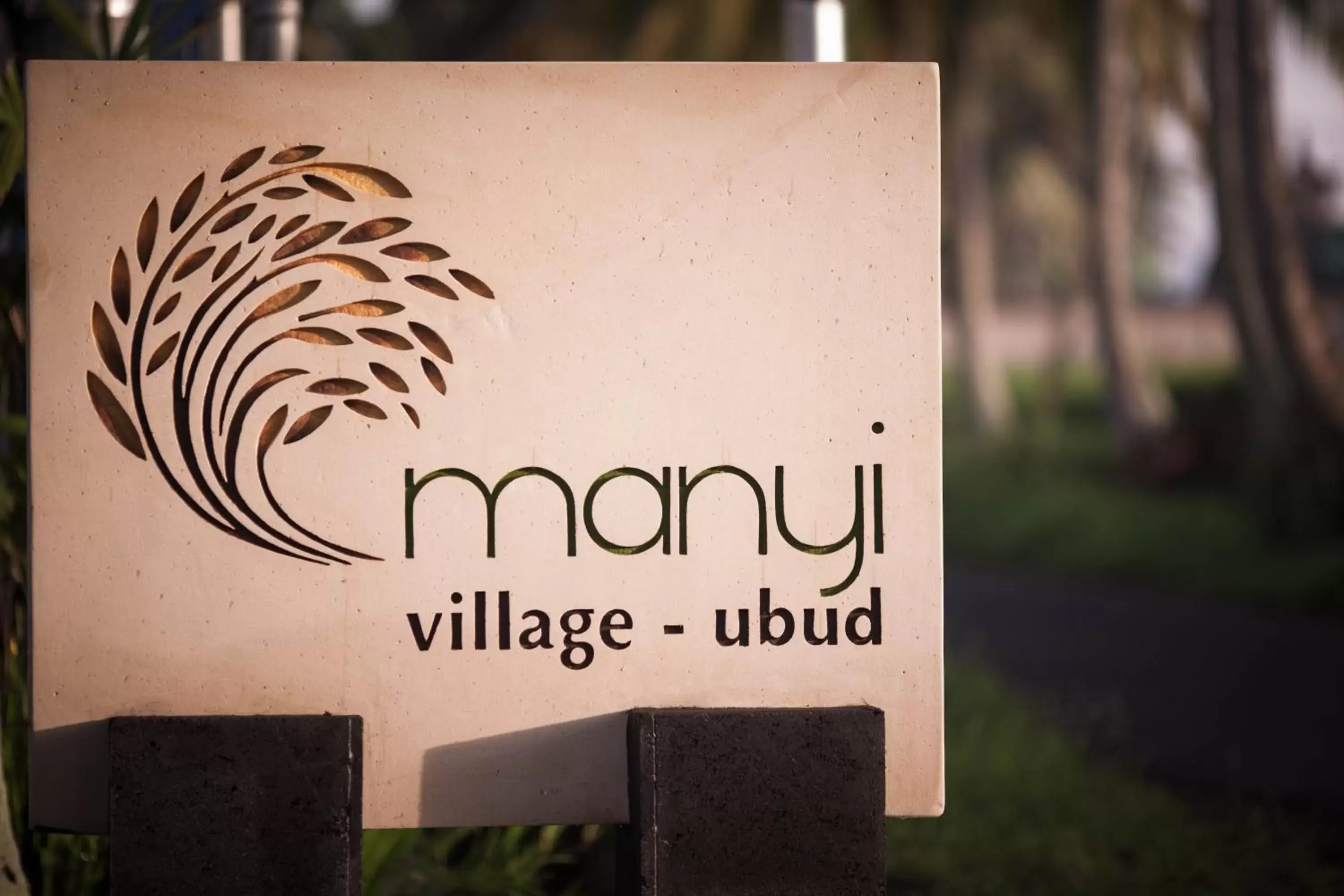 Property logo or sign in Manyi Village Ubud