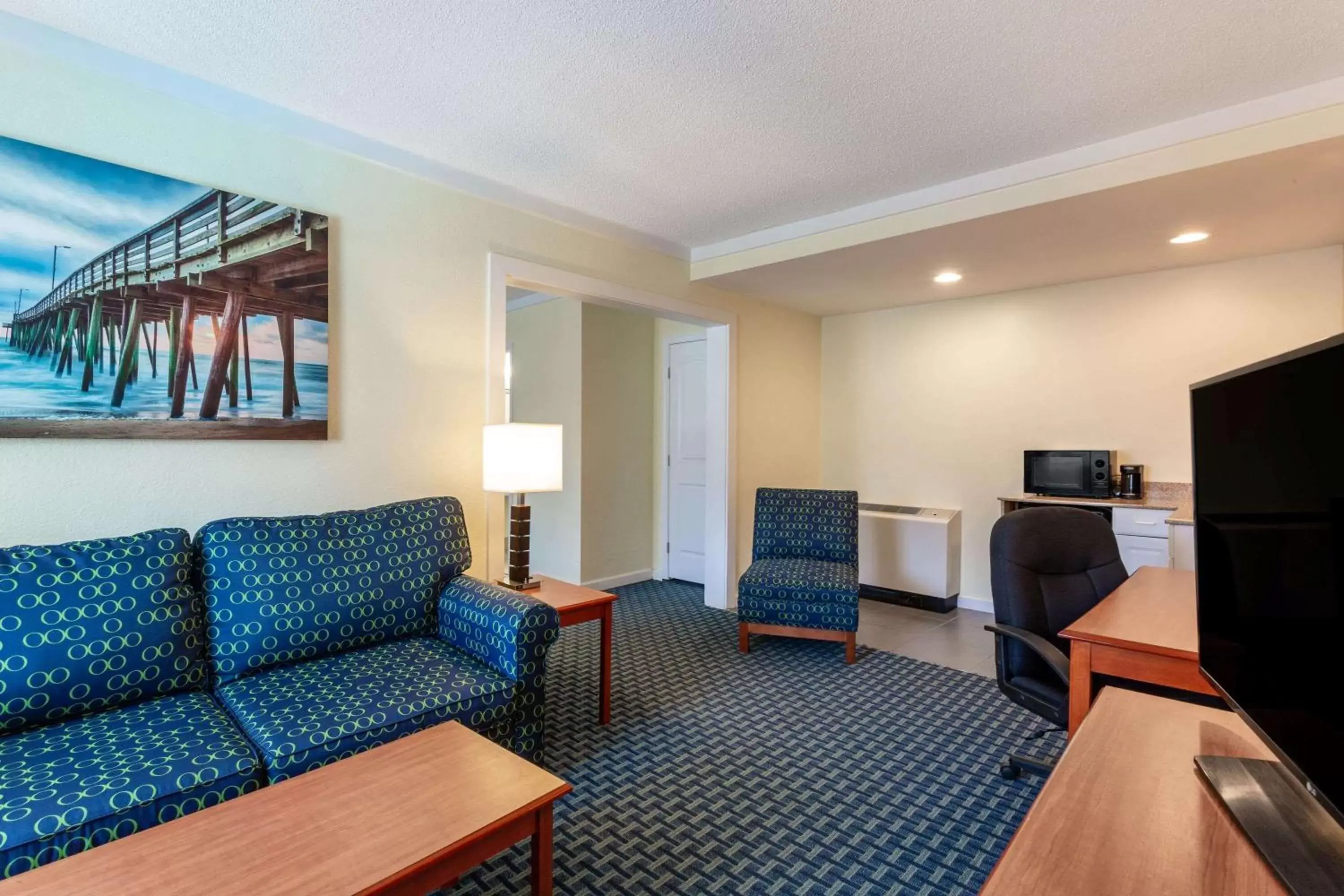 Photo of the whole room, Seating Area in Ramada by Wyndham Virginia Beach