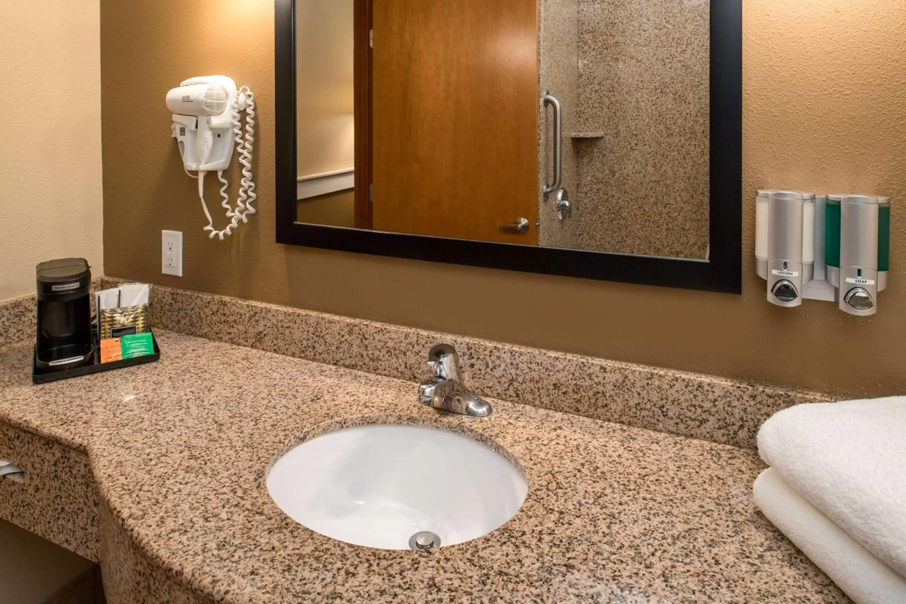 Bathroom in SureStay Plus Hotel by Best Western Kennewick Tri-Cities