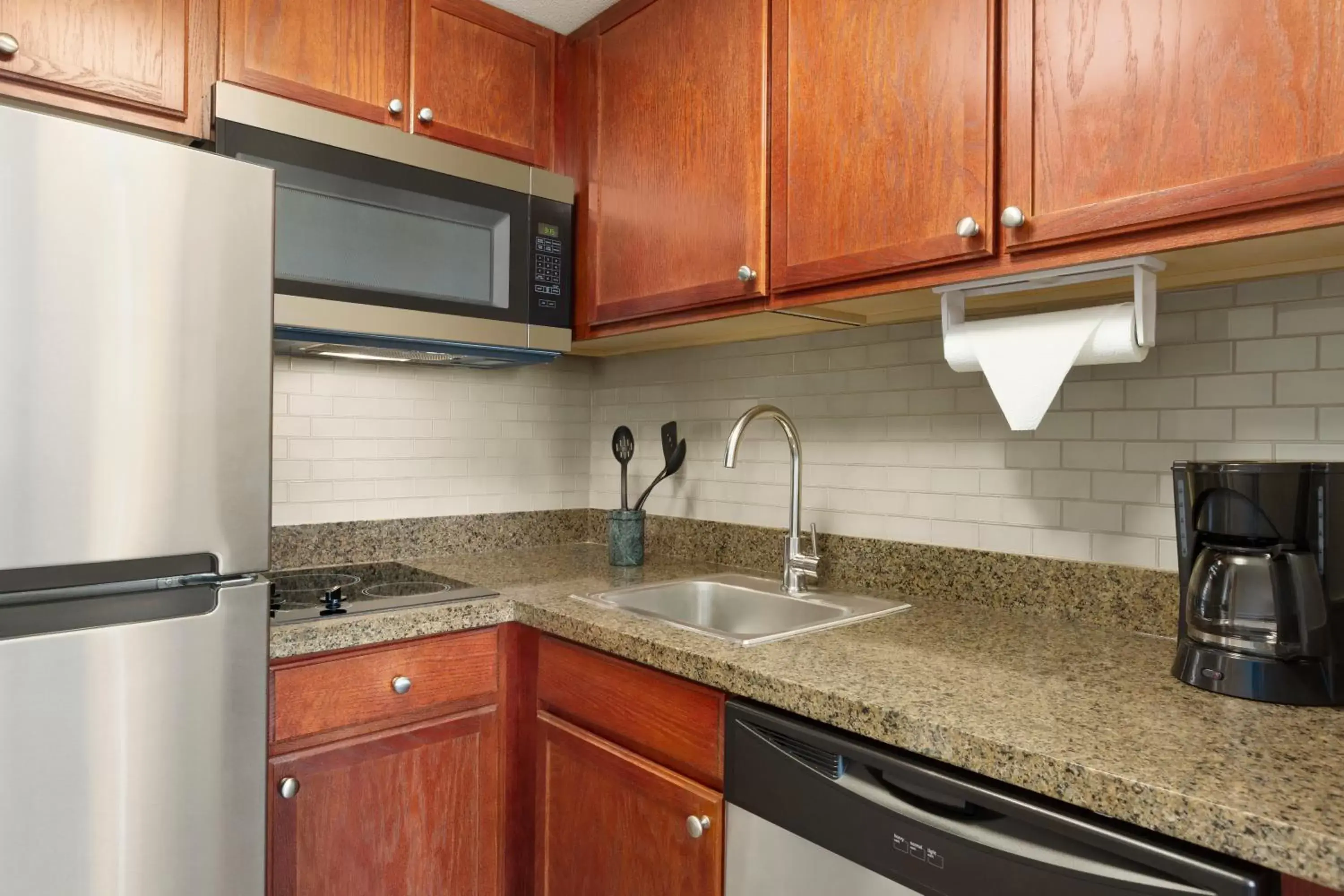 Photo of the whole room, Kitchen/Kitchenette in Staybridge Suites Tampa East- Brandon, an IHG Hotel