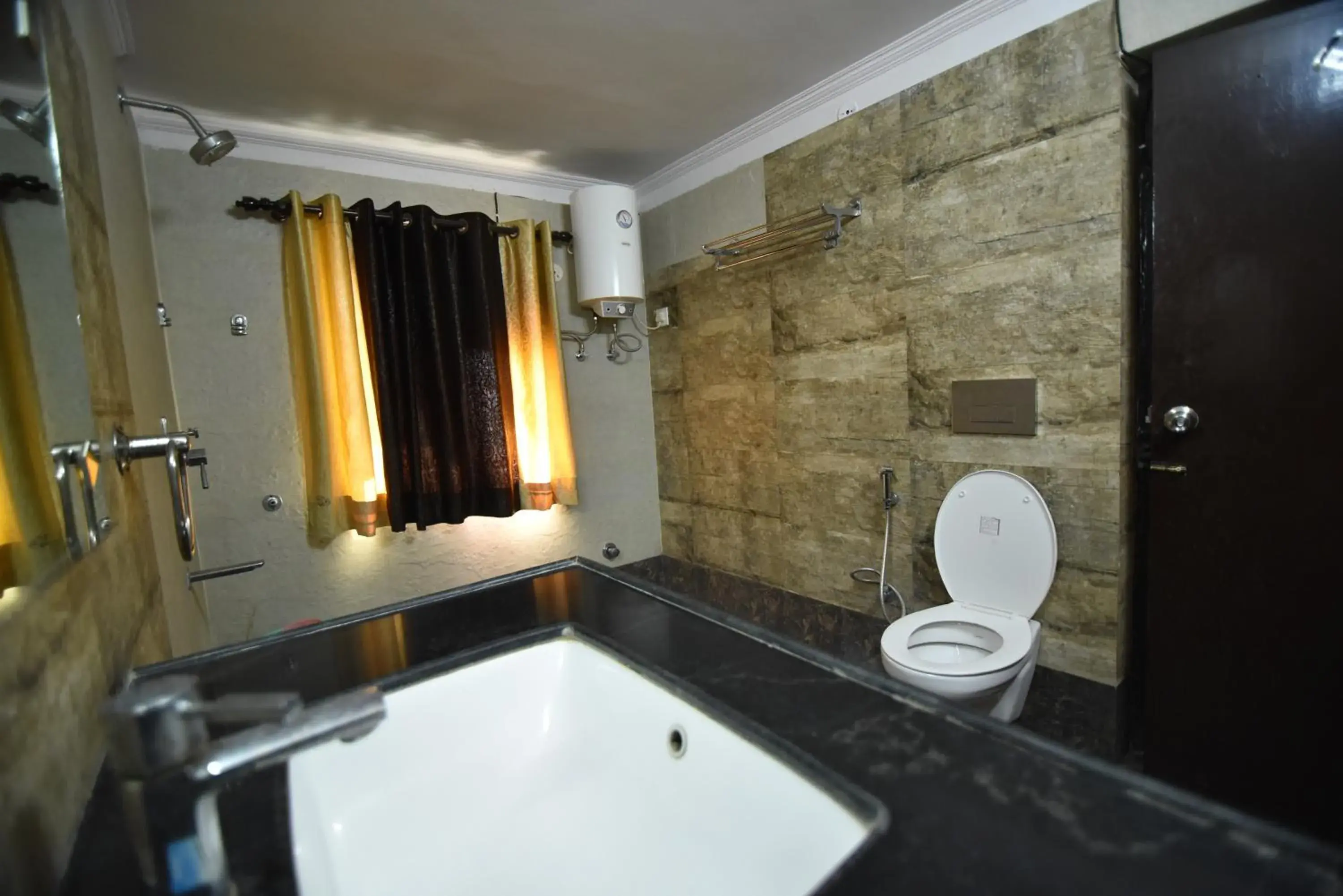 Shower, Bathroom in Hotel Vaishnavi