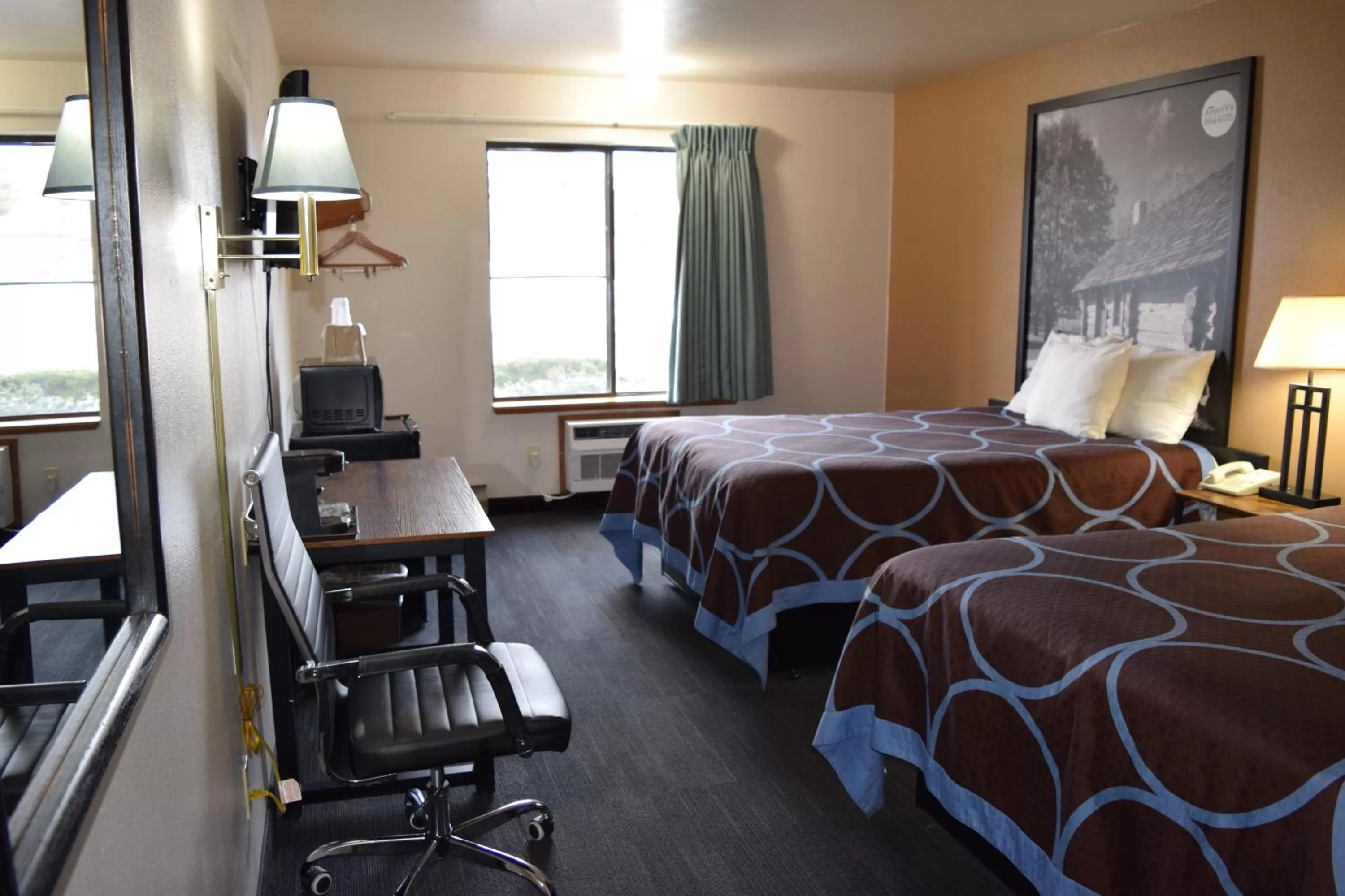 Photo of the whole room, Bed in AmeriVu Inn and Suites Shawano WI