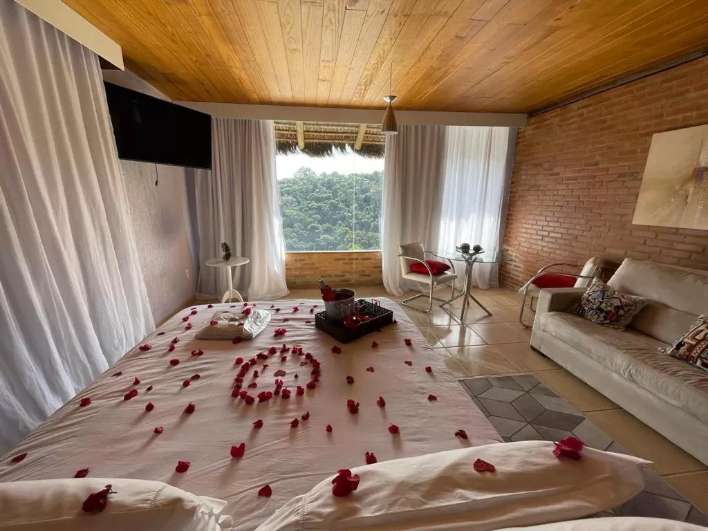 Bed in Pousada R.N.C. Nosso Paraíso