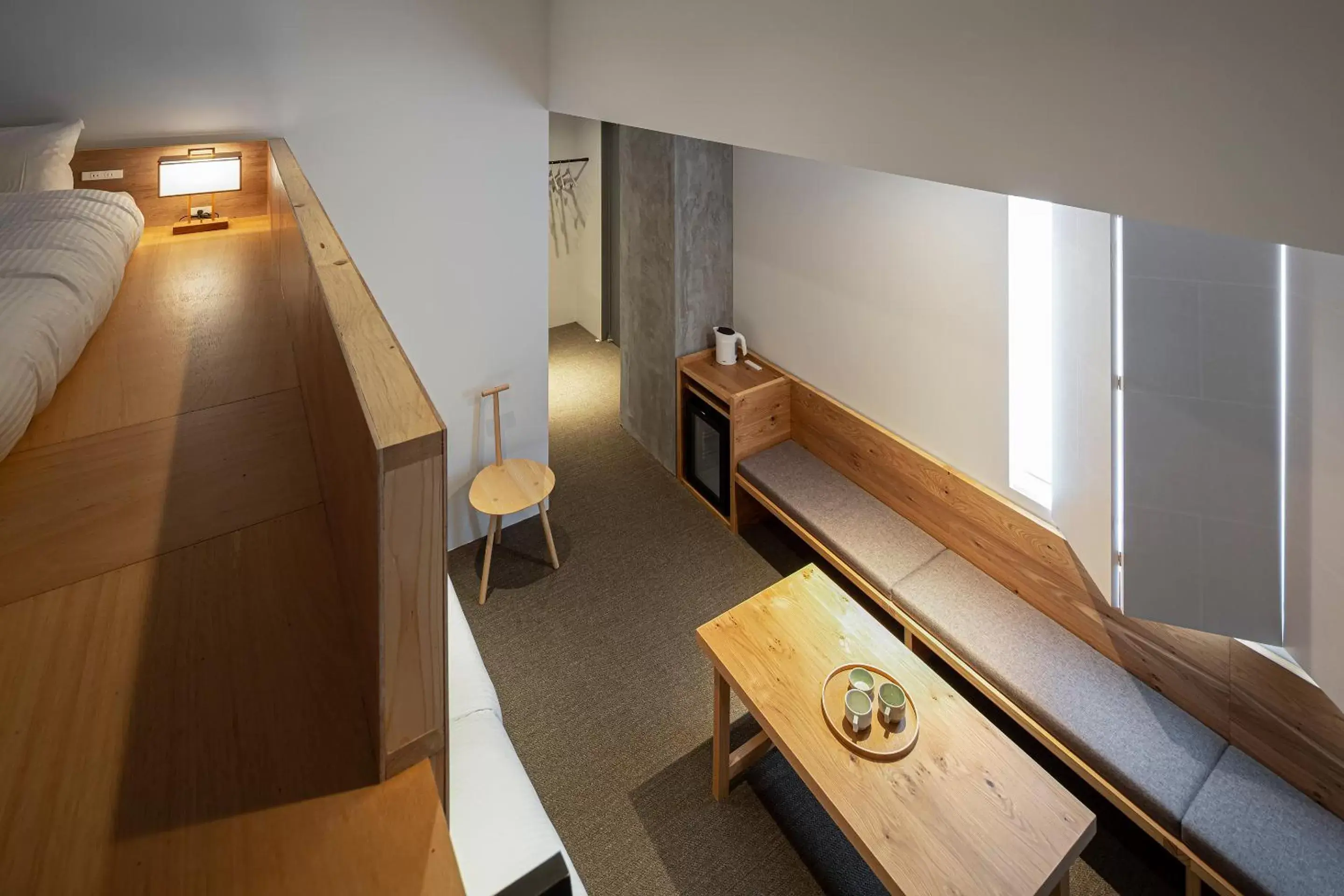 Photo of the whole room, Seating Area in TSUGU Kyoto Sanjo by THE SHARE HOTELS