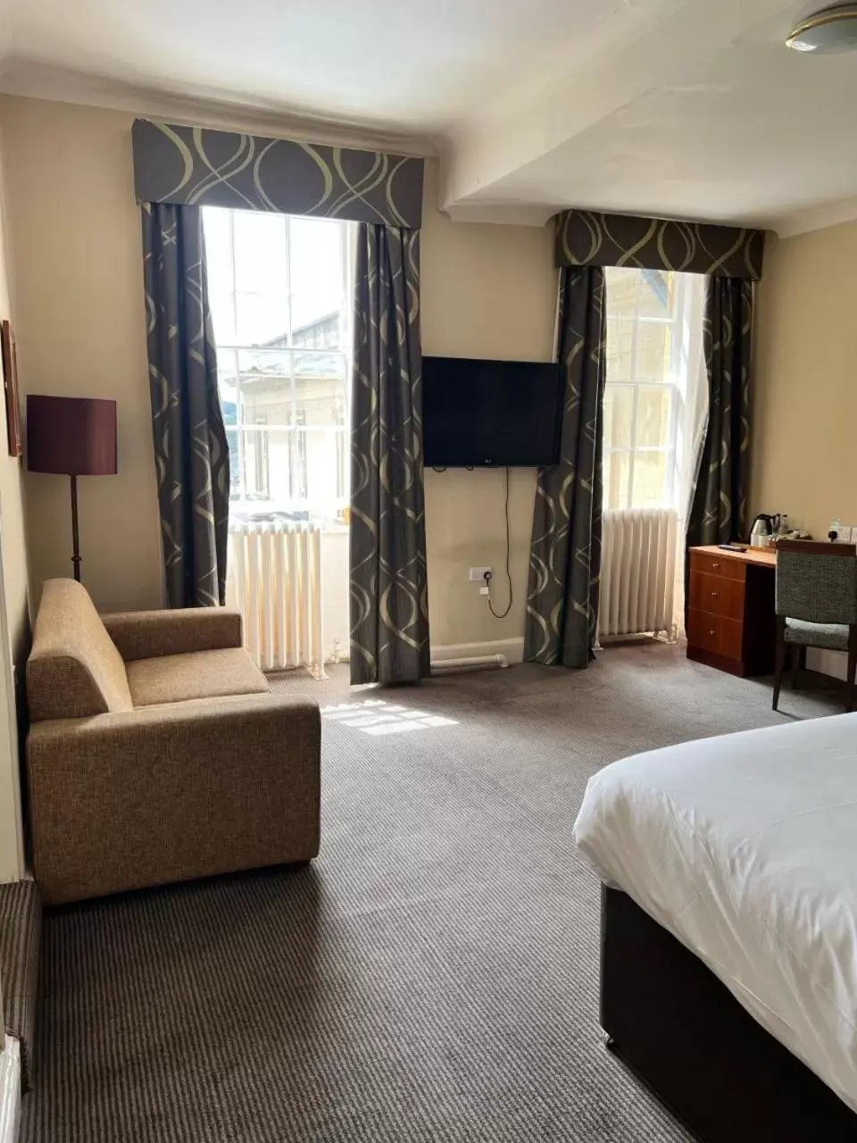 Bedroom, TV/Entertainment Center in Manor Hotel by Greene King Inns