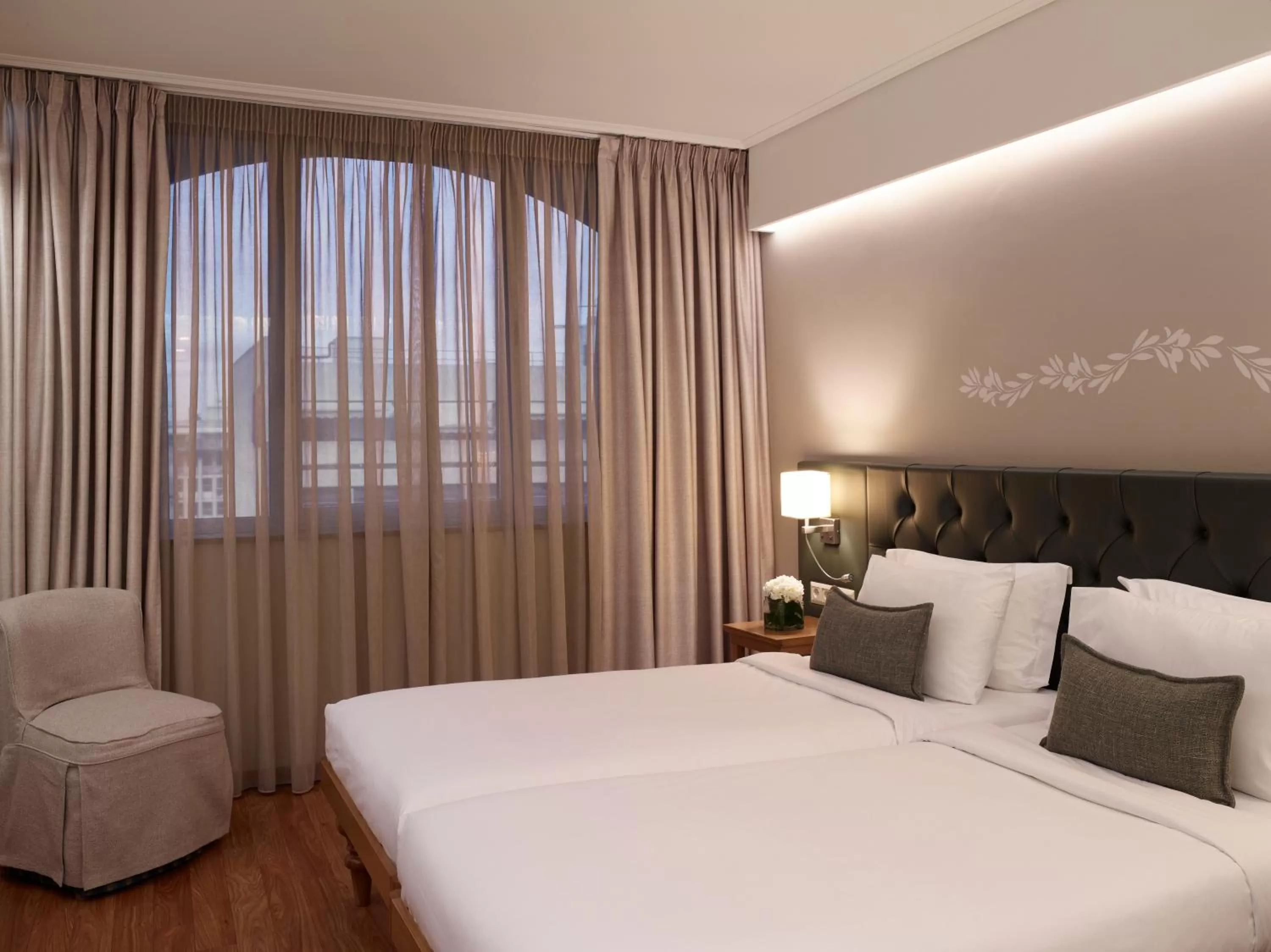 Bed in Titania Hotel
