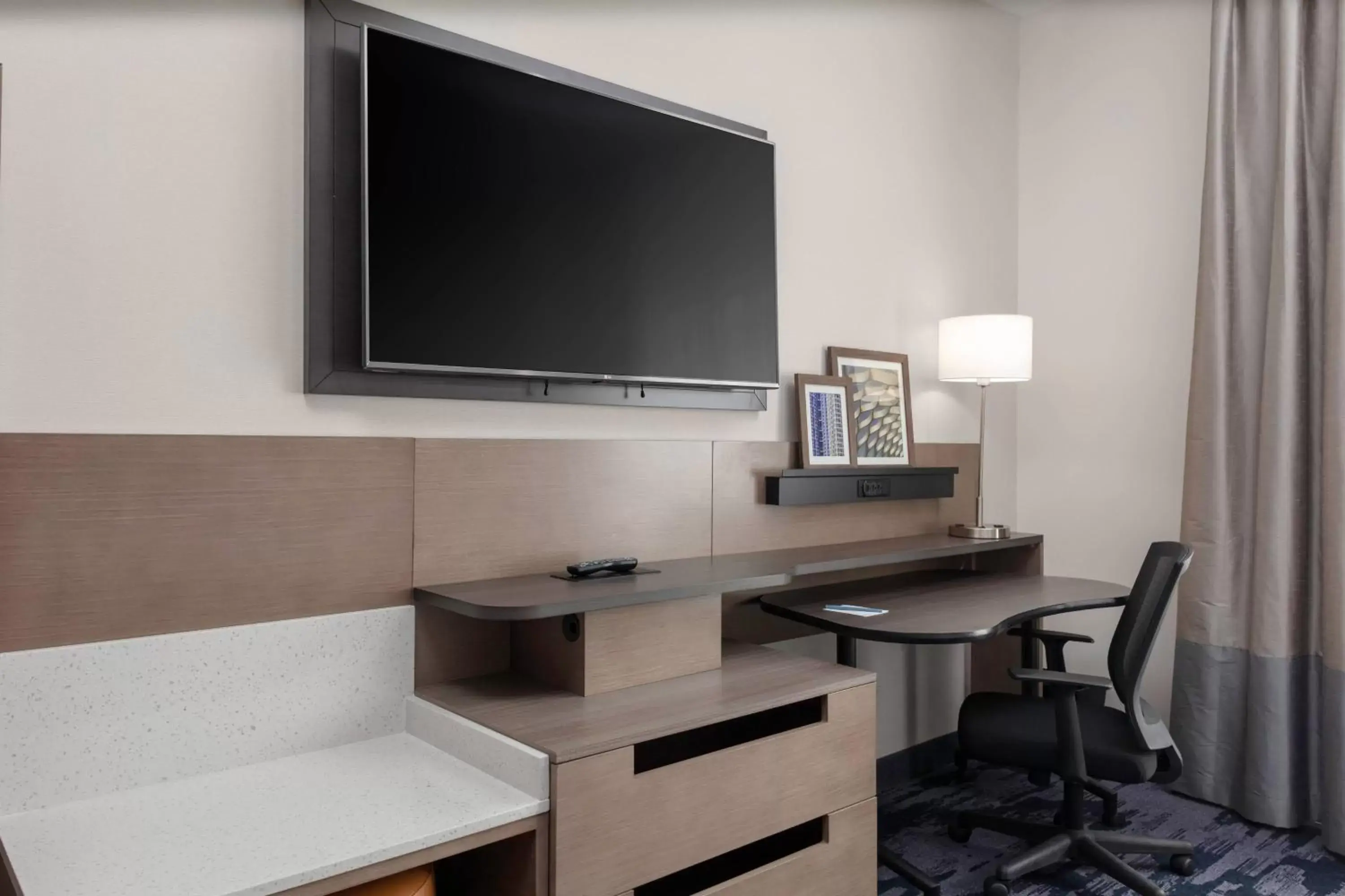 Photo of the whole room, TV/Entertainment Center in Fairfield Inn & Suites Charlotte Pineville