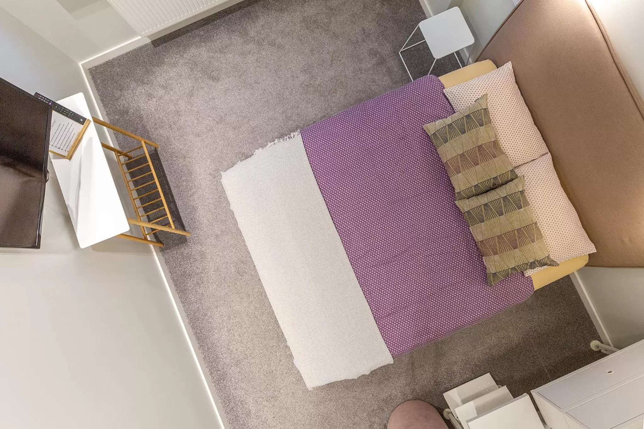 Bed in Art & Comfort Rooms