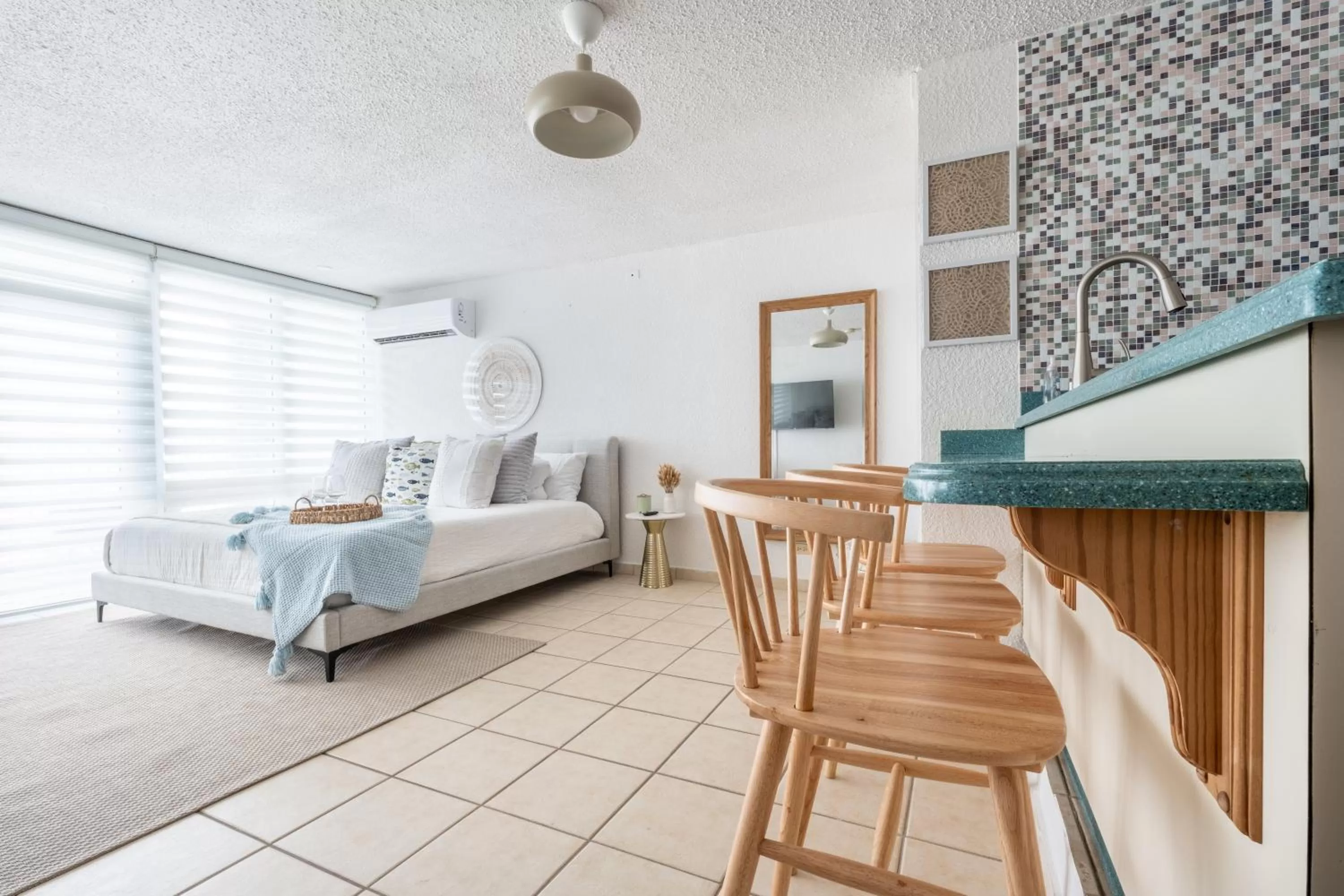 Seating area, Bed in OCEAN VIEW DELUXE SUITE: PVT. BEACH & POOL