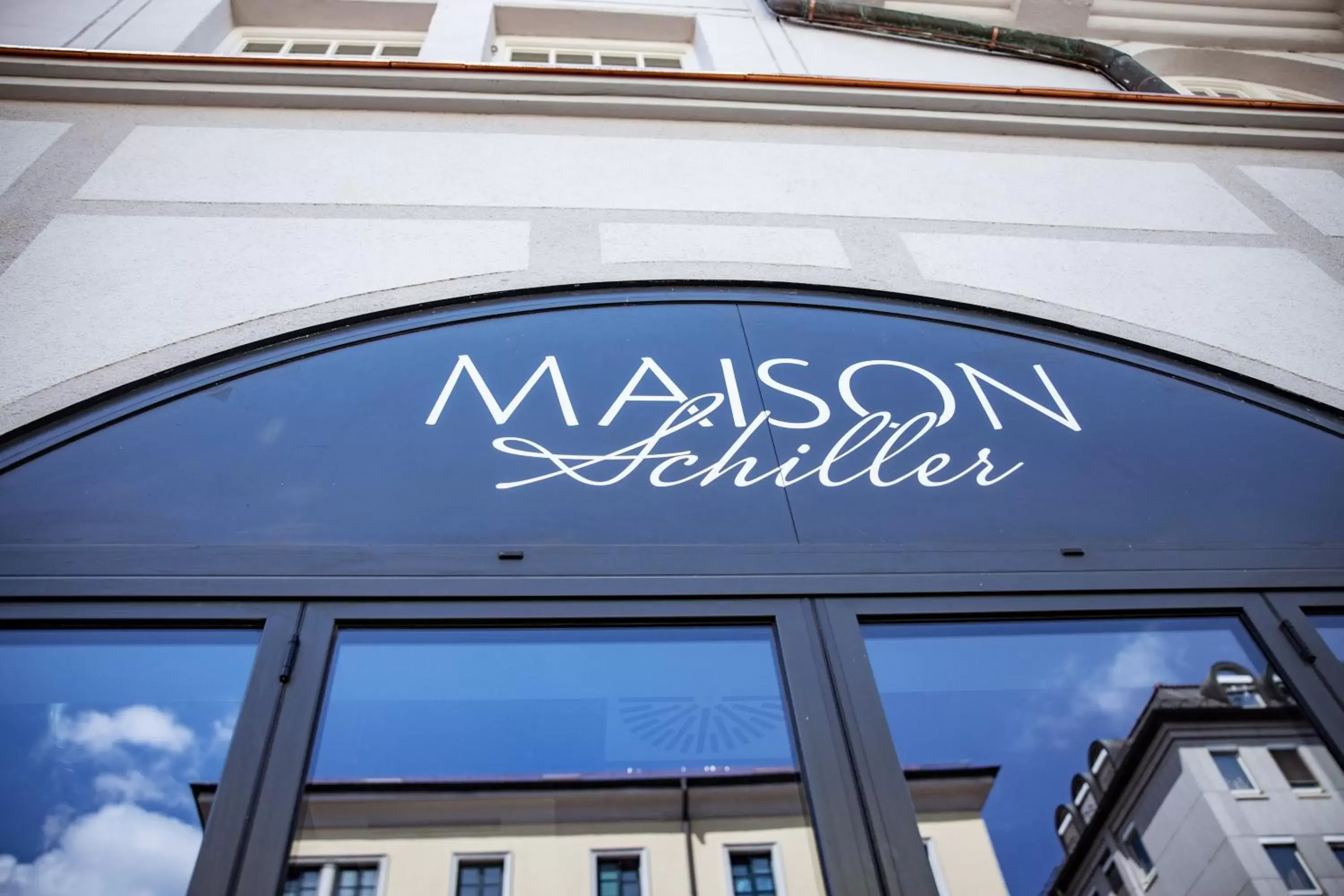 Property logo or sign in Maison Schiller by DesignCity Hotels