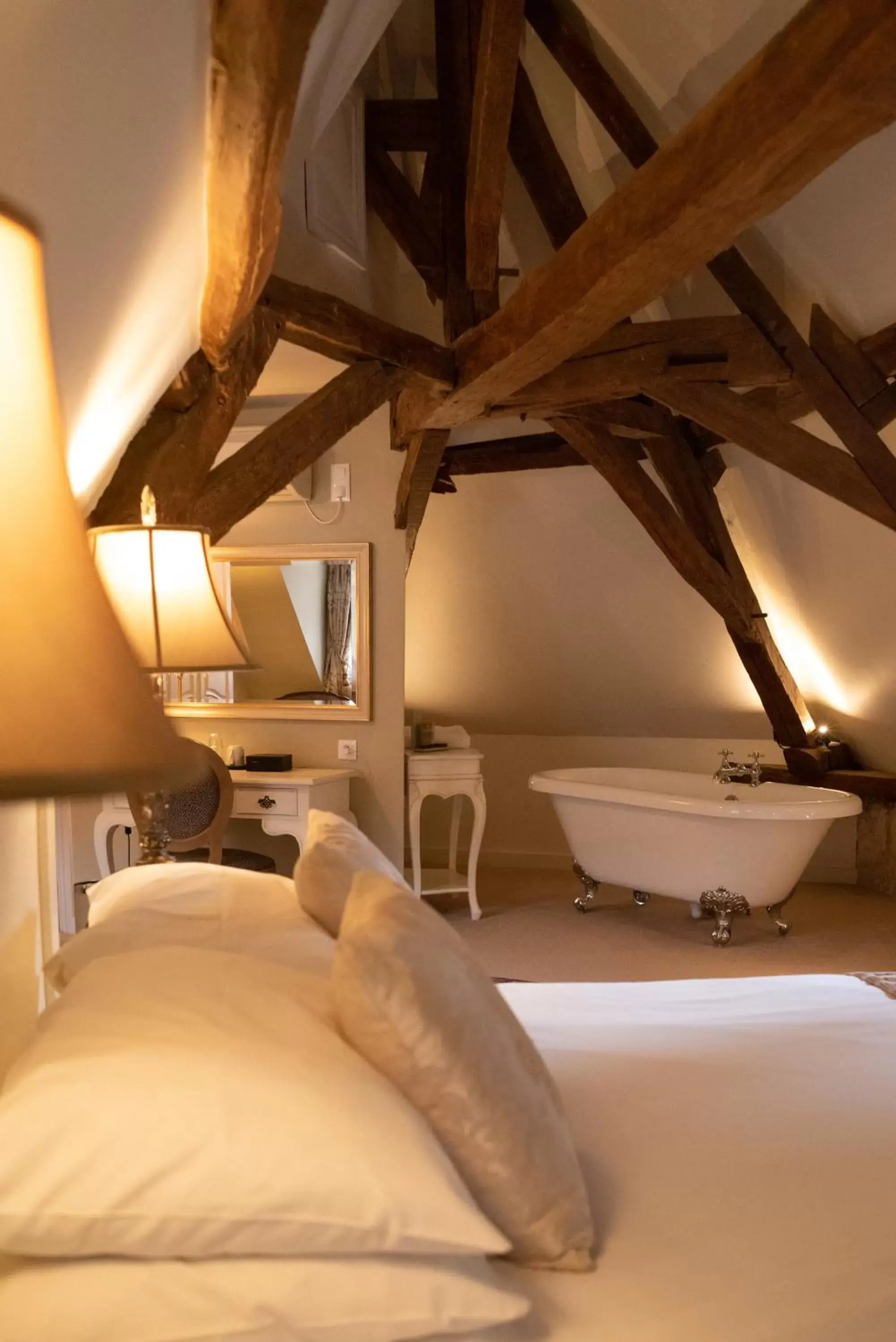 Bed in Logis Hotel De France