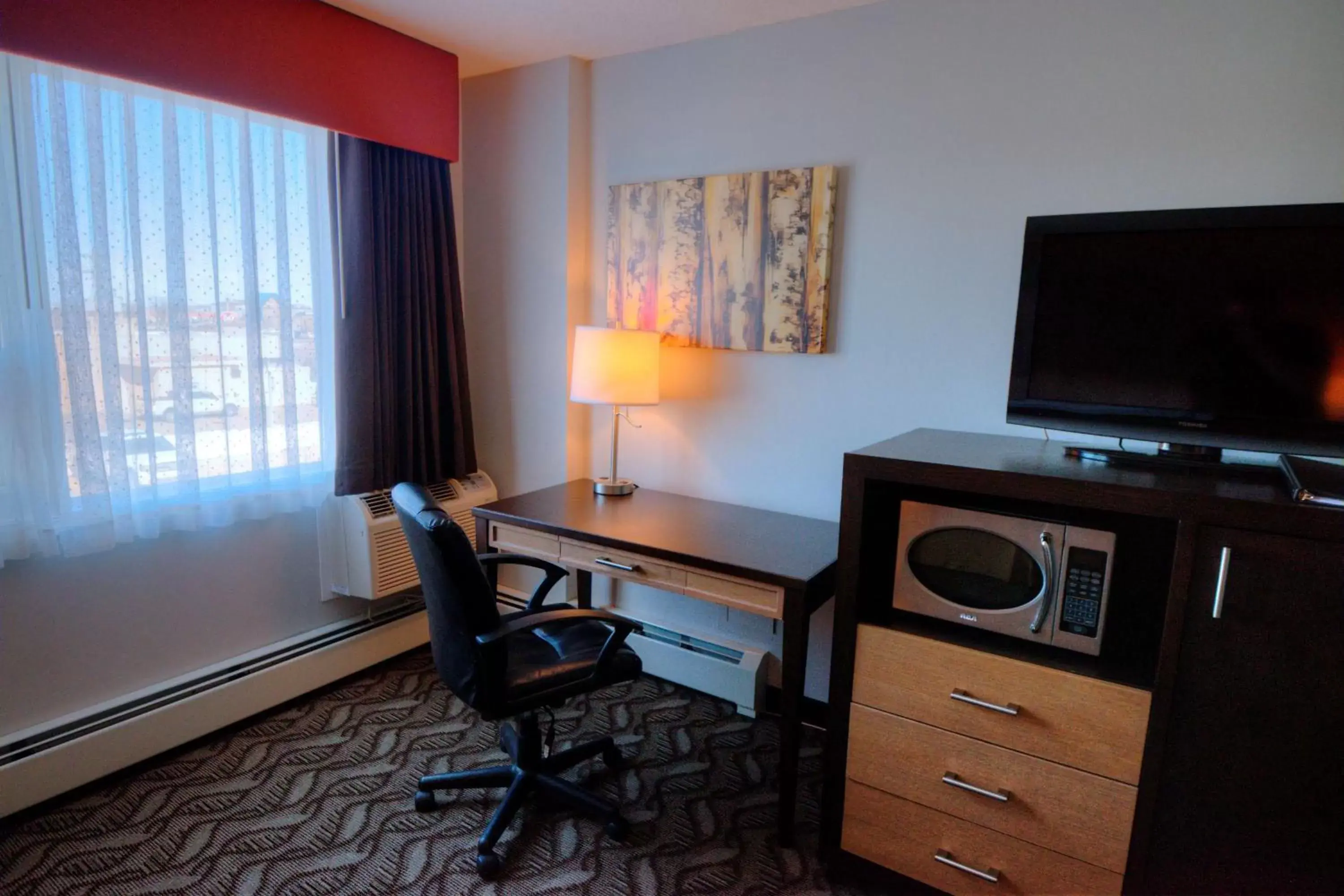 Photo of the whole room, TV/Entertainment Center in Best Western Airdrie
