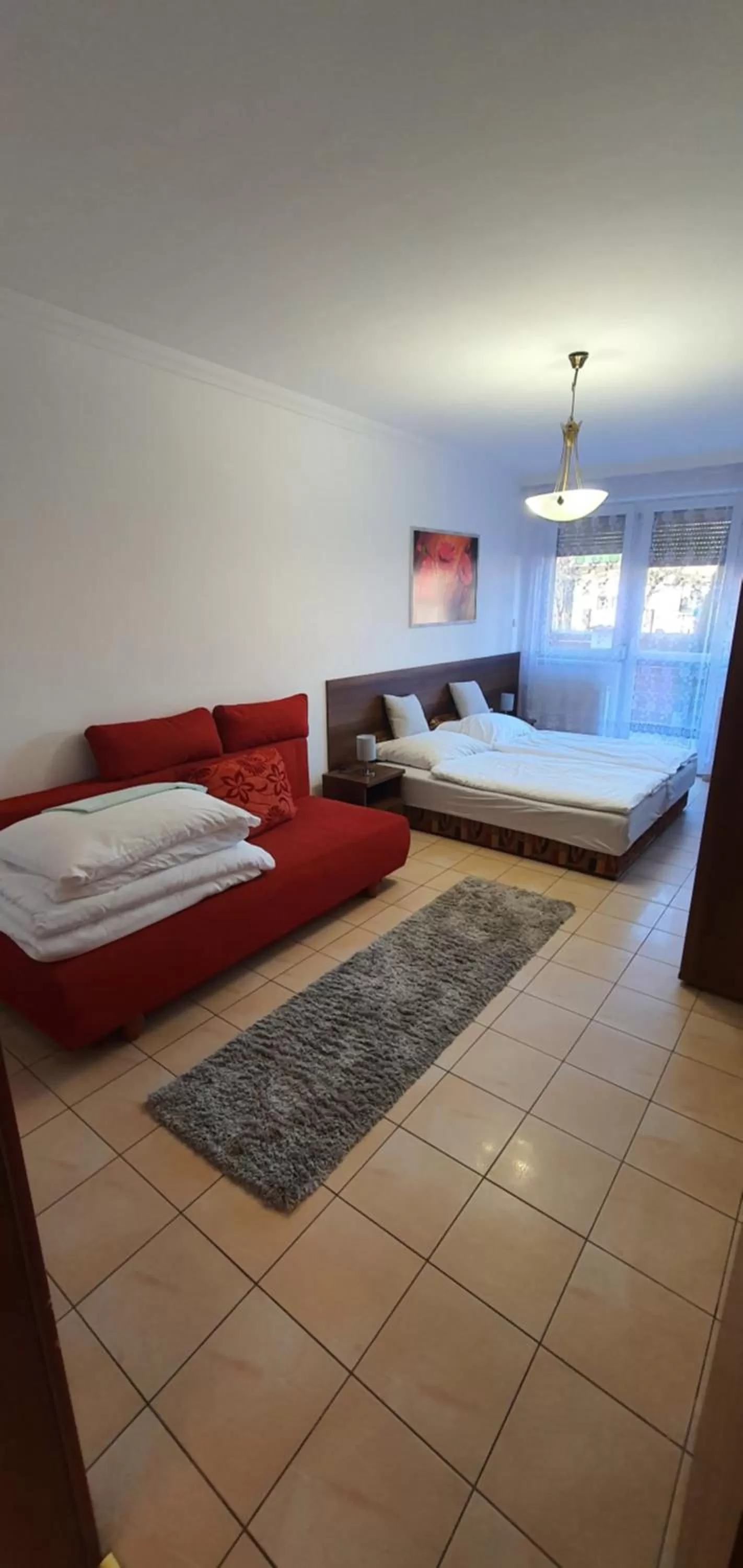 Bed in Aqua Oazis Apartman