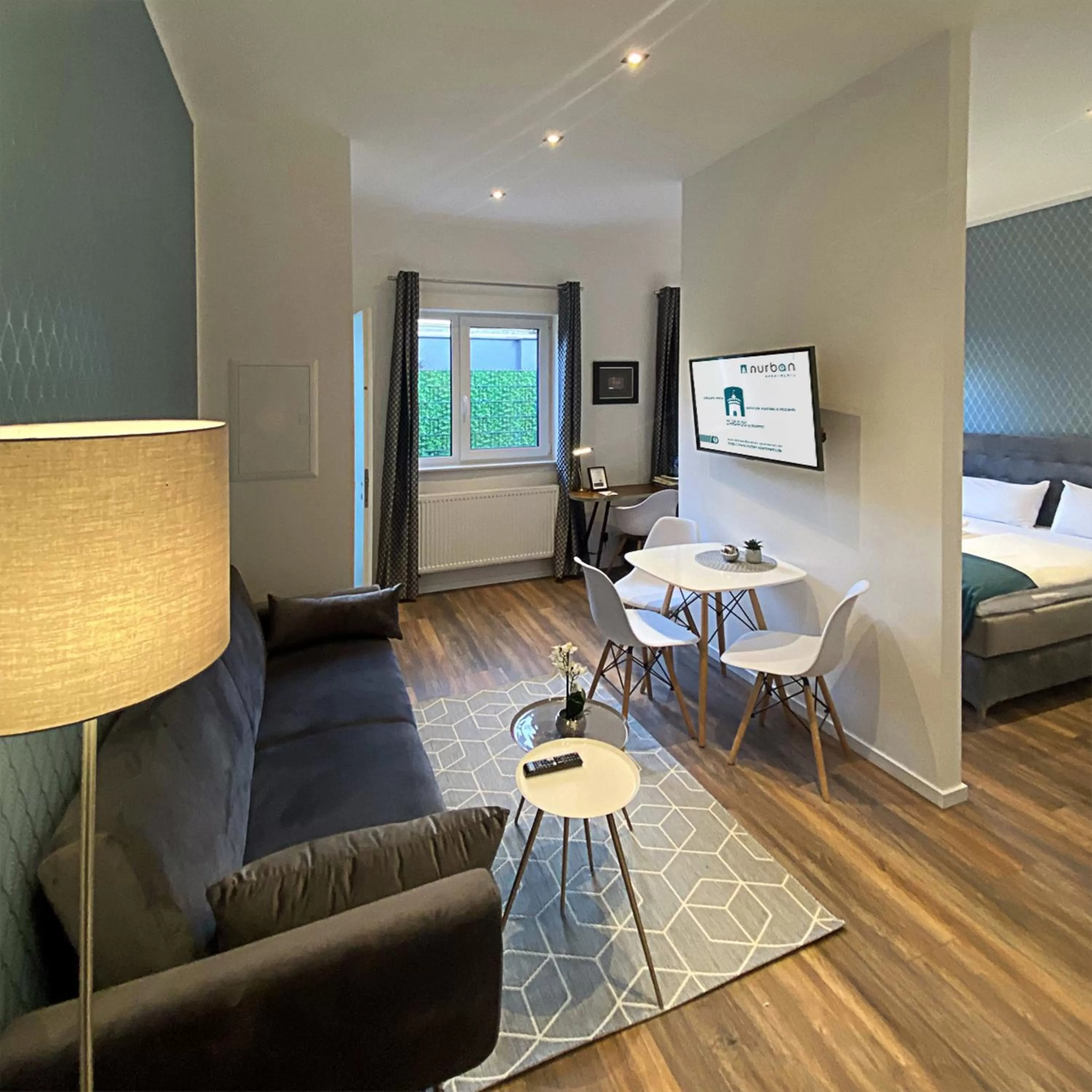 Living room, Bed in Nurban Apartments Oldtown