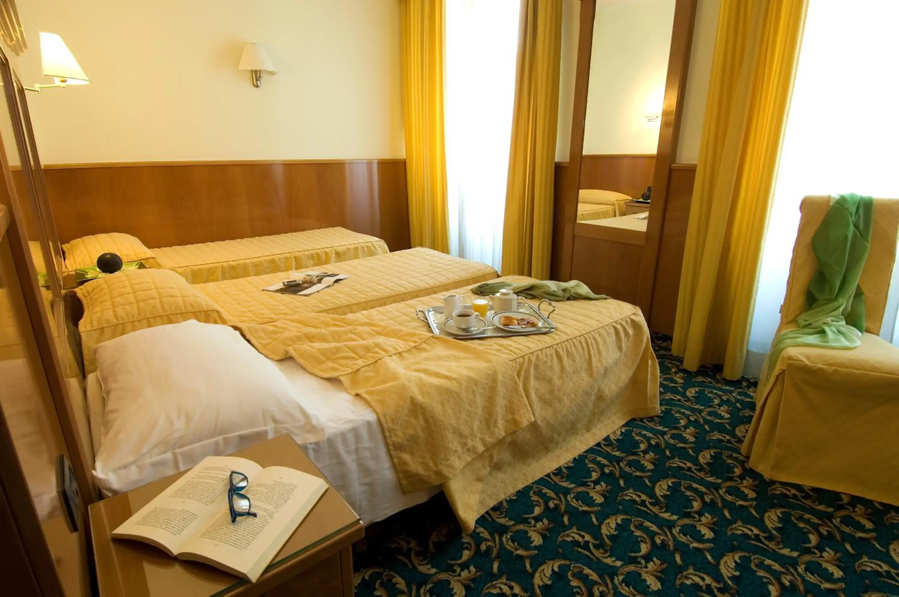 Photo of the whole room in Hotel Cinque Giornate Photo of the whole room in Hotel Cinque Giornate