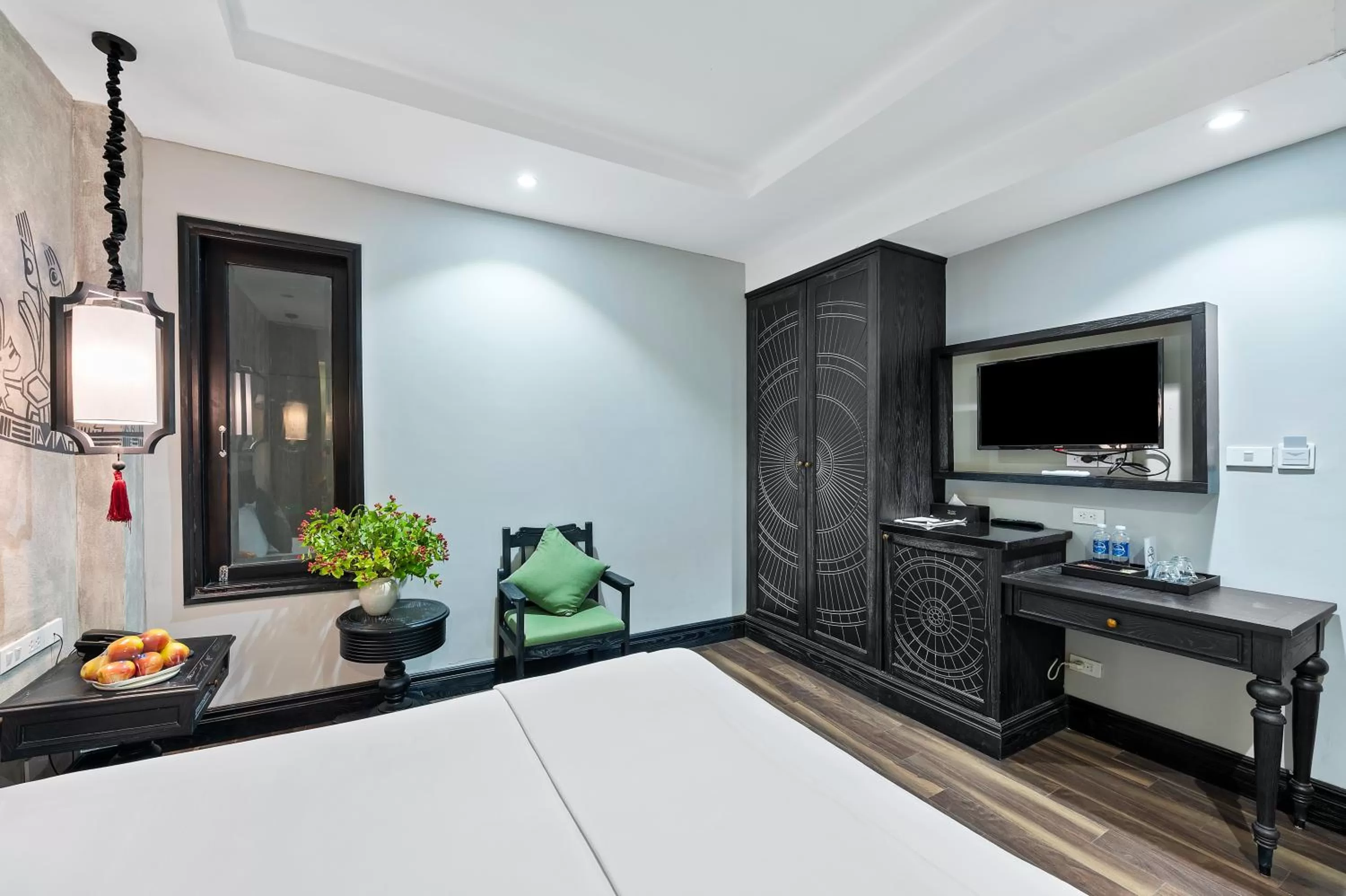 Bed, TV/Entertainment Center in 22Land Residence Hotel & Spa 52 Ngo Huyen