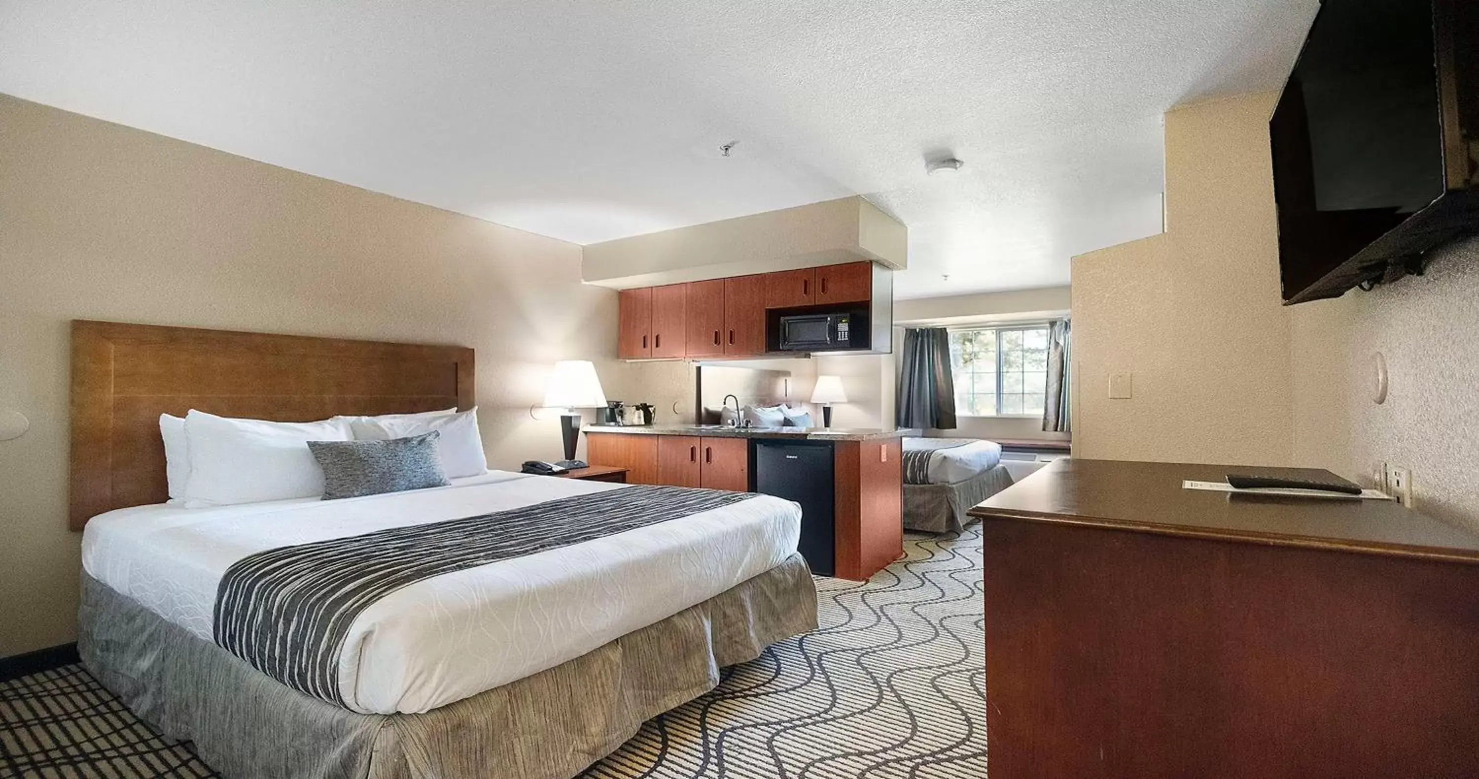 Queen Room with Two Queen Beds and Wet Bar in SureStay Plus Hotel by Best Western Rocklin Queen Room with Two Queen Beds and Wet Bar in SureStay Plus Hotel by Best Western Rocklin