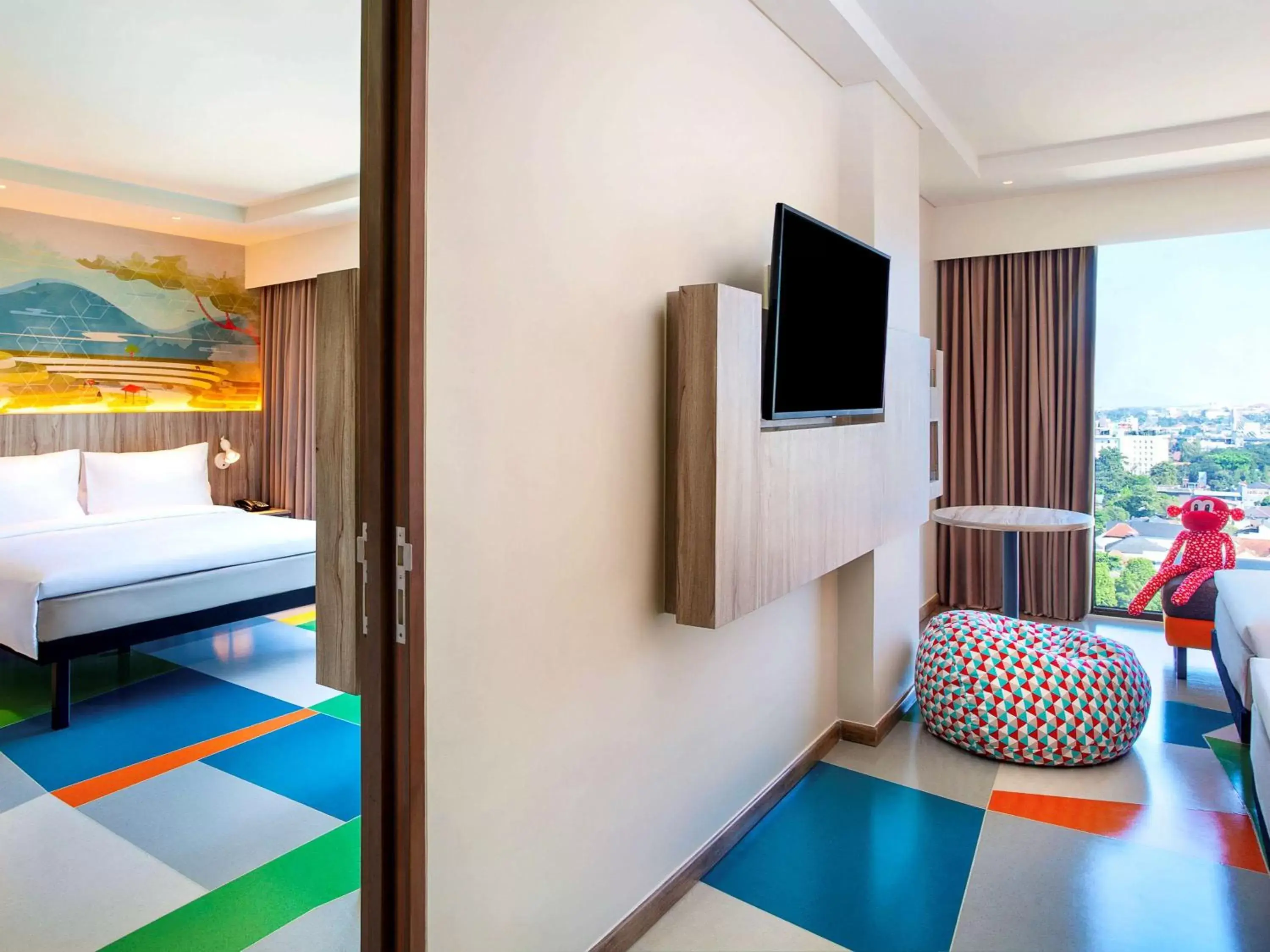 Photo of the whole room, TV/Entertainment Center in ibis Styles Bandung Grand Central