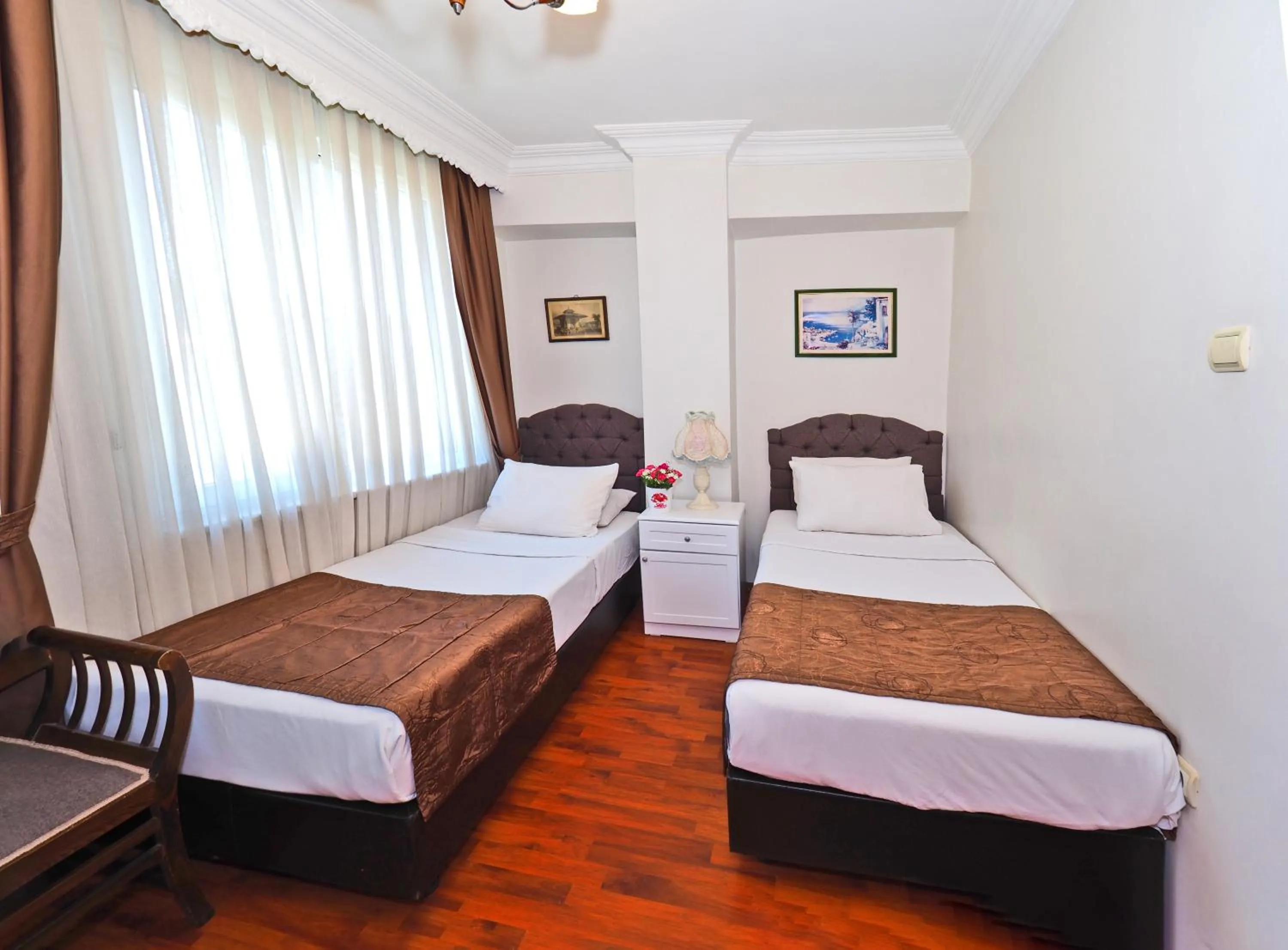 Photo of the whole room, Bed in The Sunrise Hotel