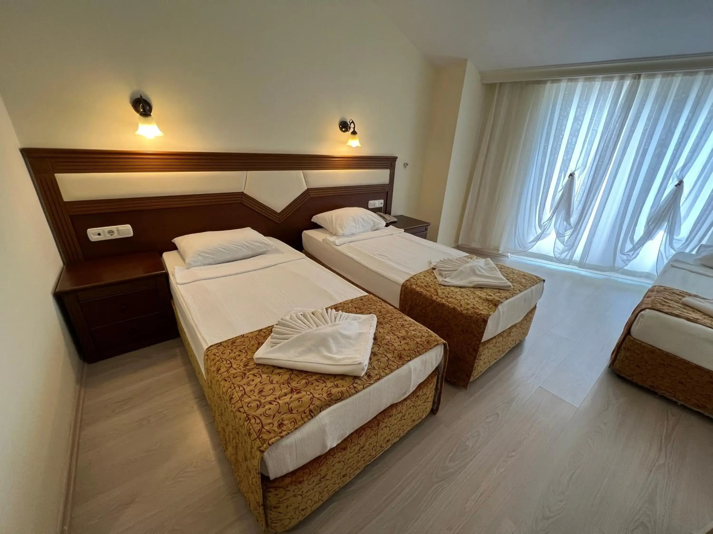 Bed in Valeri Beach Hotel