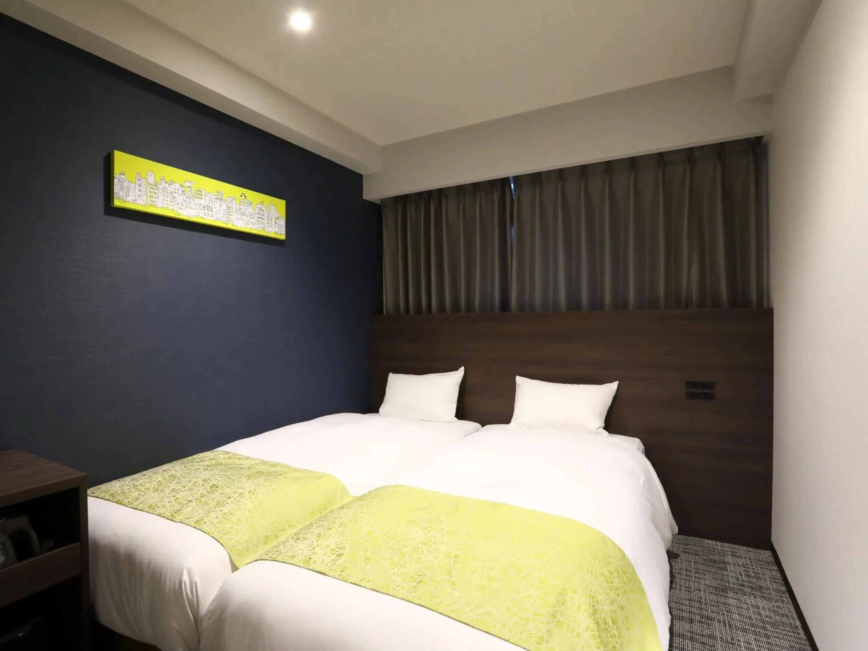 Bed in Hotel Wing International Ikebukuro